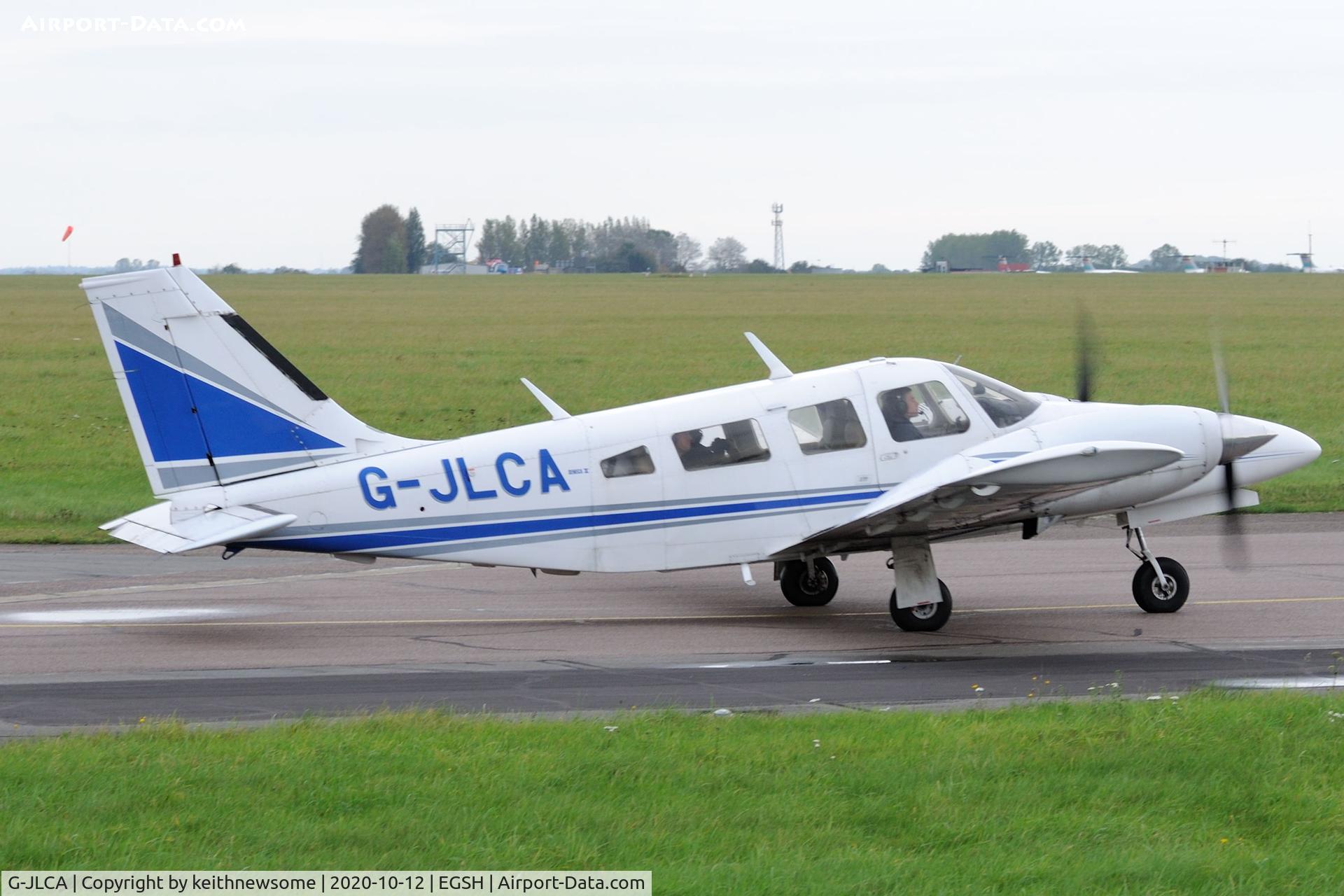 G-JLCA, 1978 Piper PA-34-200T Seneca II C/N 34-7870428, Leaving Norwich.