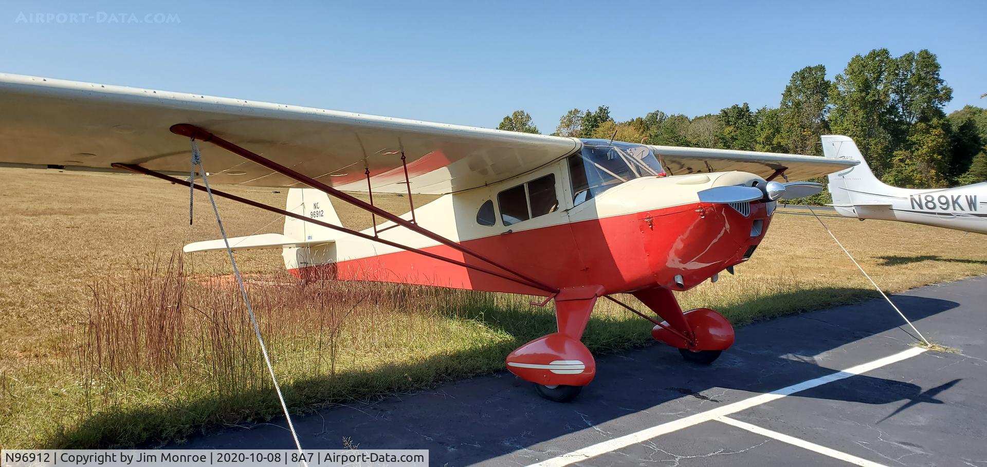 N96912, 1946 Taylorcraft BC12-D C/N 9212, Sitting in the grass at Twin Lakes, Advance, NC