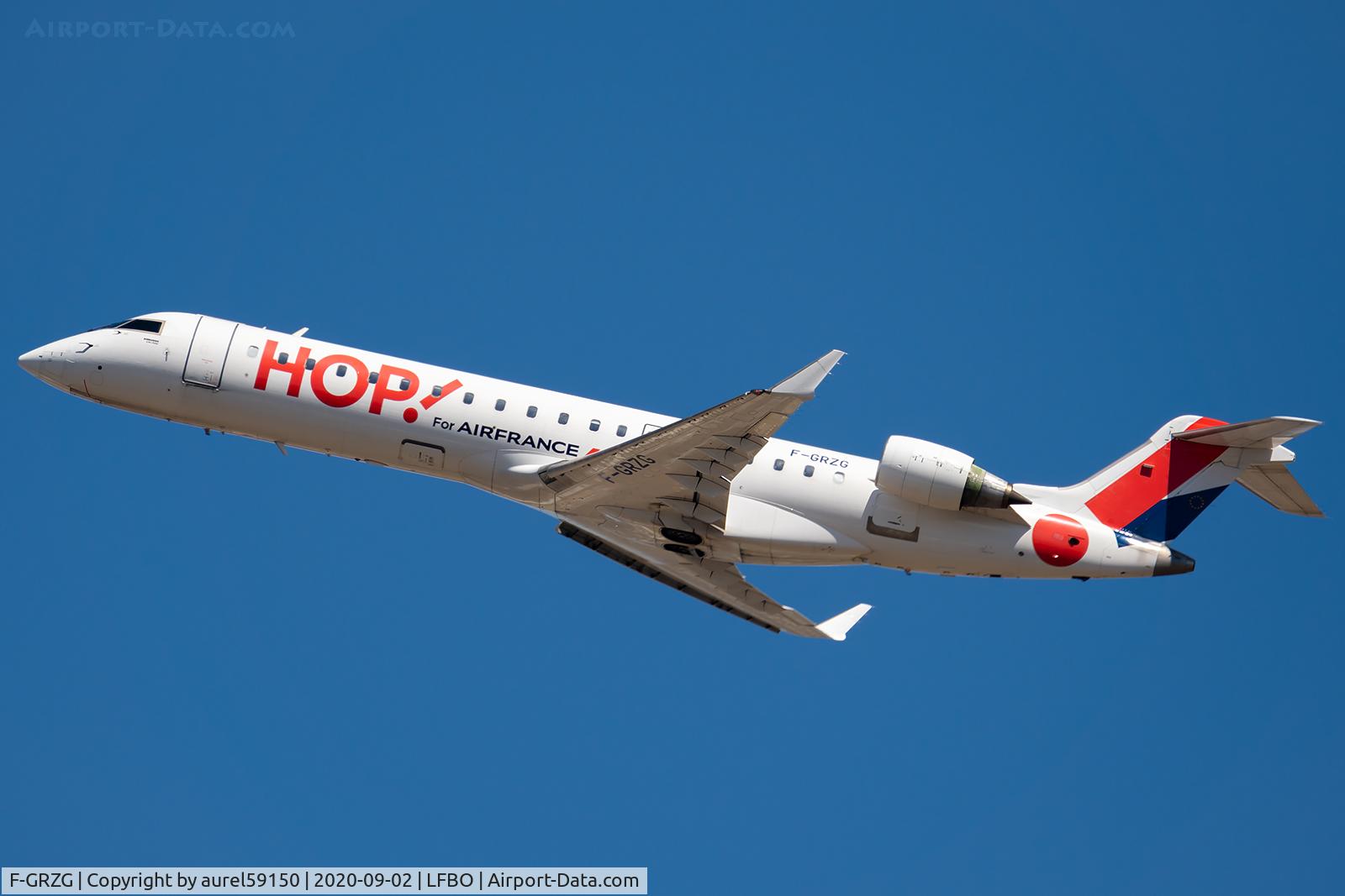 F-GRZG, 2002 Bombardier CRJ-701 (CL-600-2C10) Regional Jet C/N 10037, take off from TLS