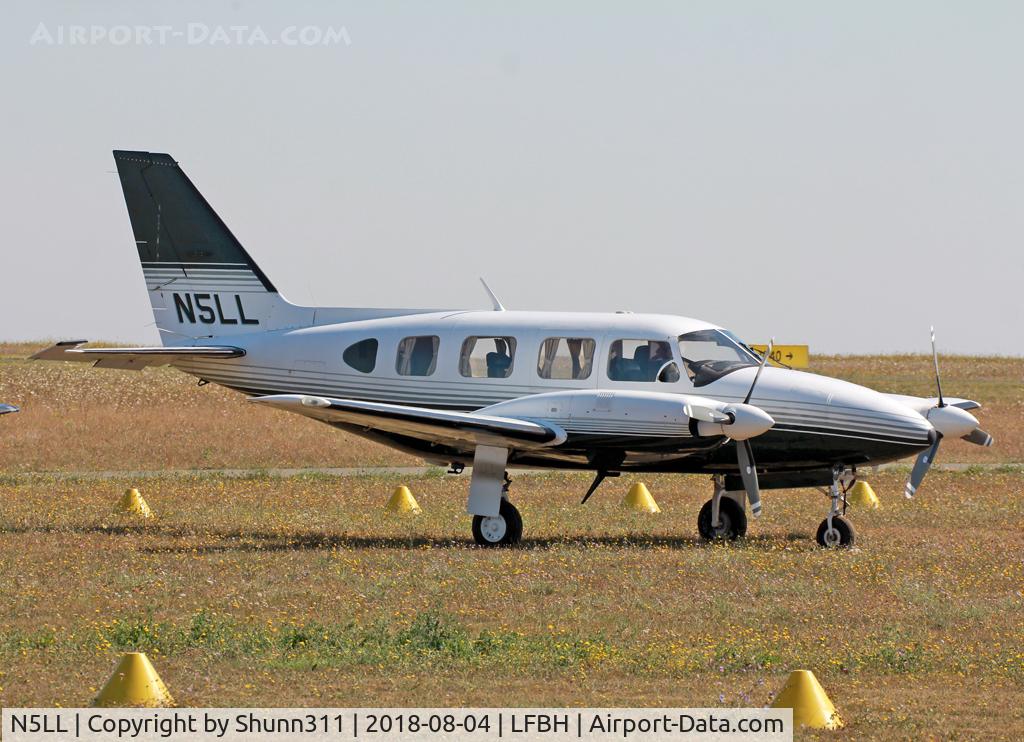 N5LL, 1978 Piper PA-31-310C Navajo C/N 31-7812041, Parked in the grass...