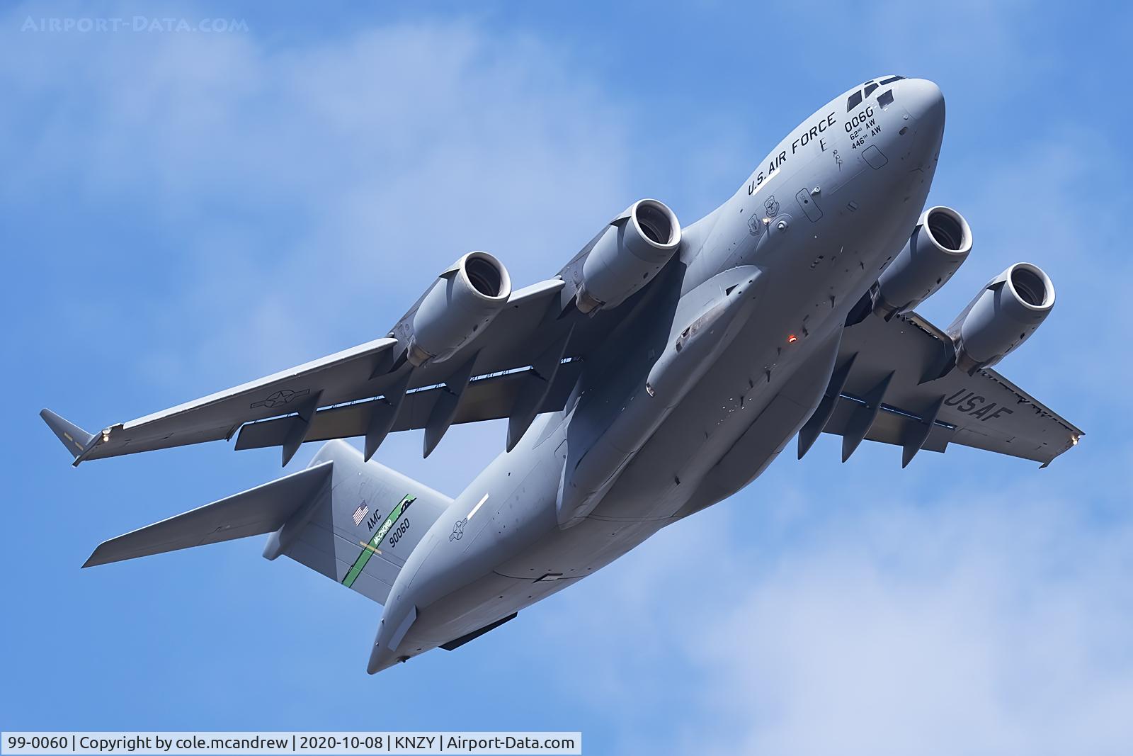 99-0060, 1999 Boeing C-17A Globemaster III C/N 50064/P-60, Reach 466 departing Was north island