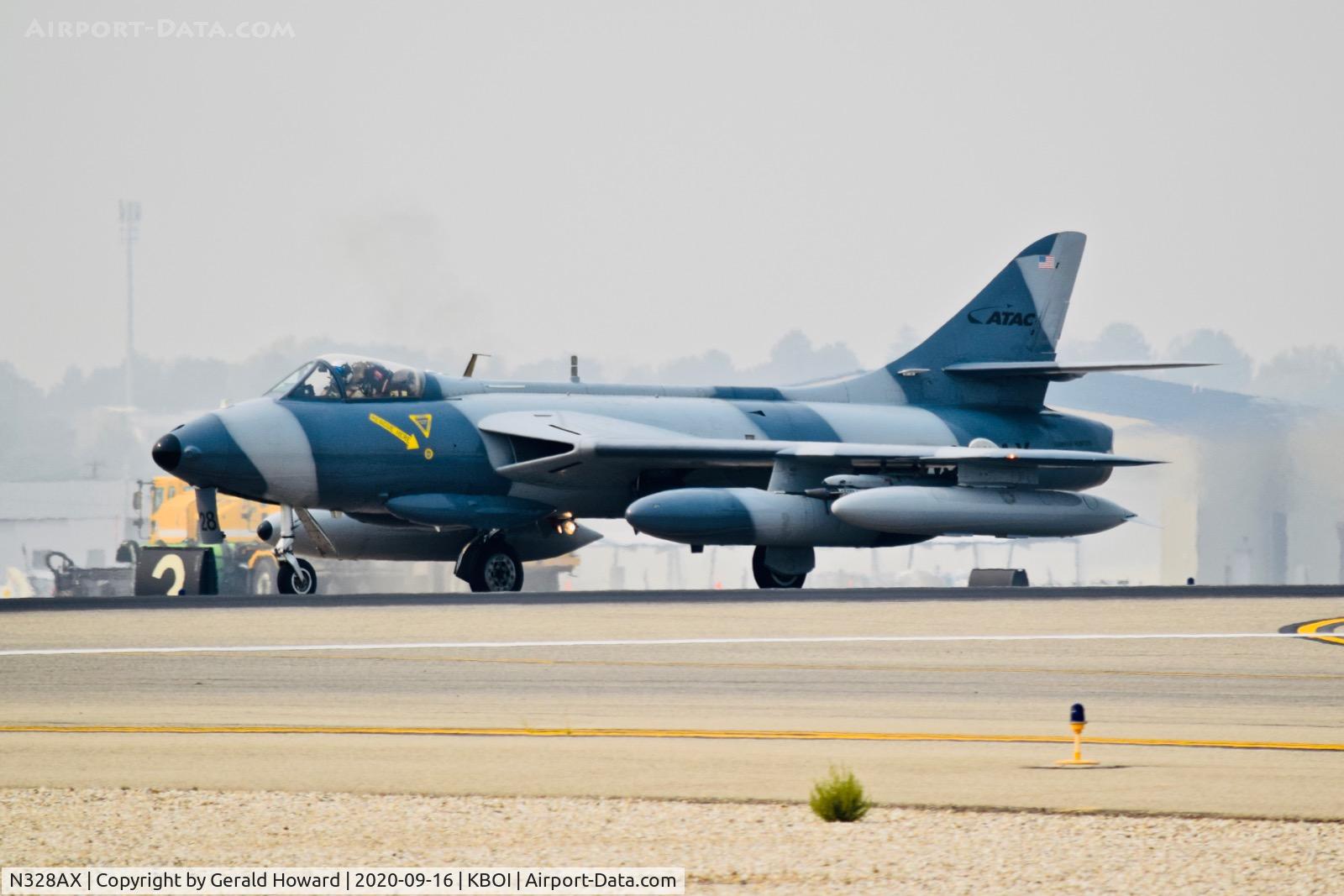 N328AX, 1958 Hawker Hunter Mk.58 C/N 41H-697398, Take off on 10L.  Airborne Tactical Advantage Company (ATAC), Newport News, VA.