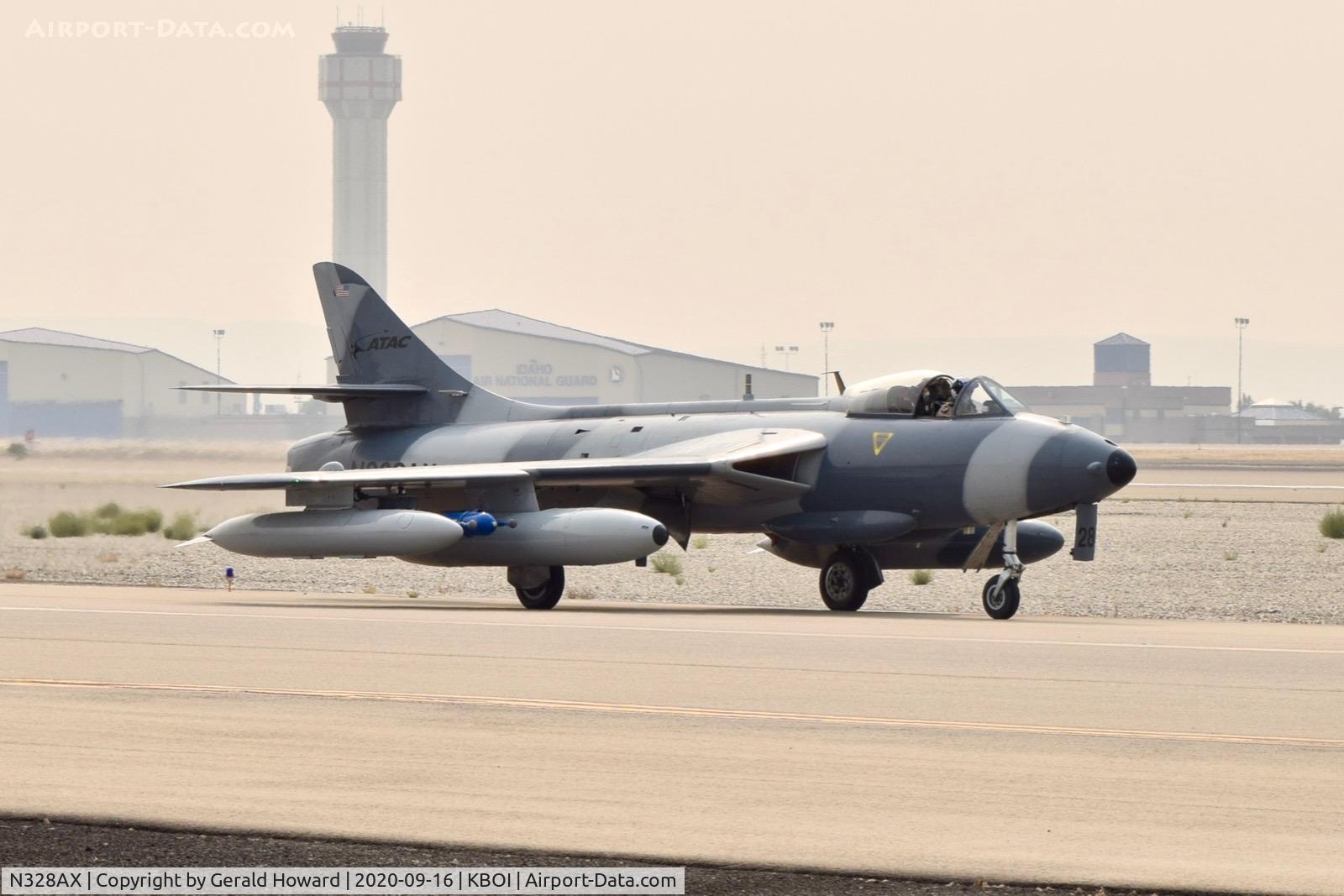 N328AX, 1958 Hawker Hunter Mk.58 C/N 41H-697398, Taxiing on Alpha.  Airborne Tactical Advantage Company (ATAC), Newport News, VA.
