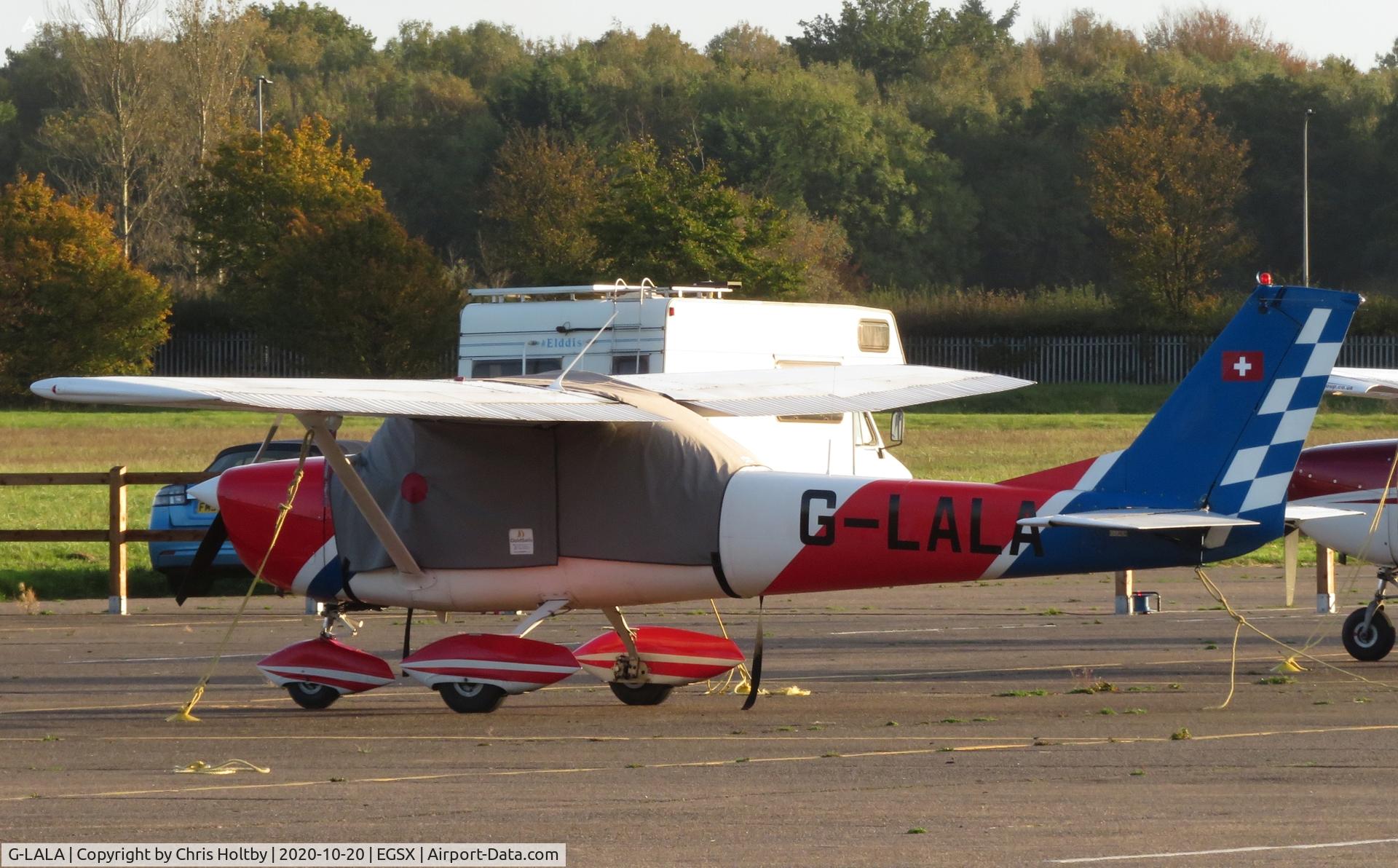 G-LALA, 1969 Reims FA150K Aerobat C/N FA1500005, Parked and now based at North Weald, Essex with its ex-Swiss insignia still showing on the tail.