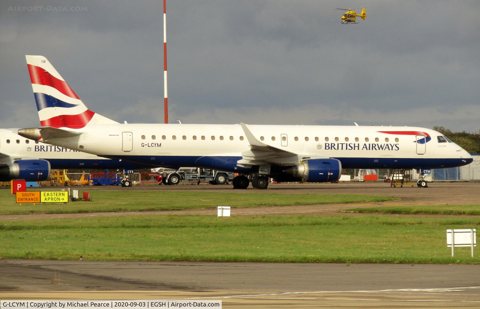 G-LCYM, 2010 Embraer 190SR (ERJ-190-100SR) C/N 19000351, Parked on the Eastern Apron during COVID-19 storage. Note G-EMSS in background.