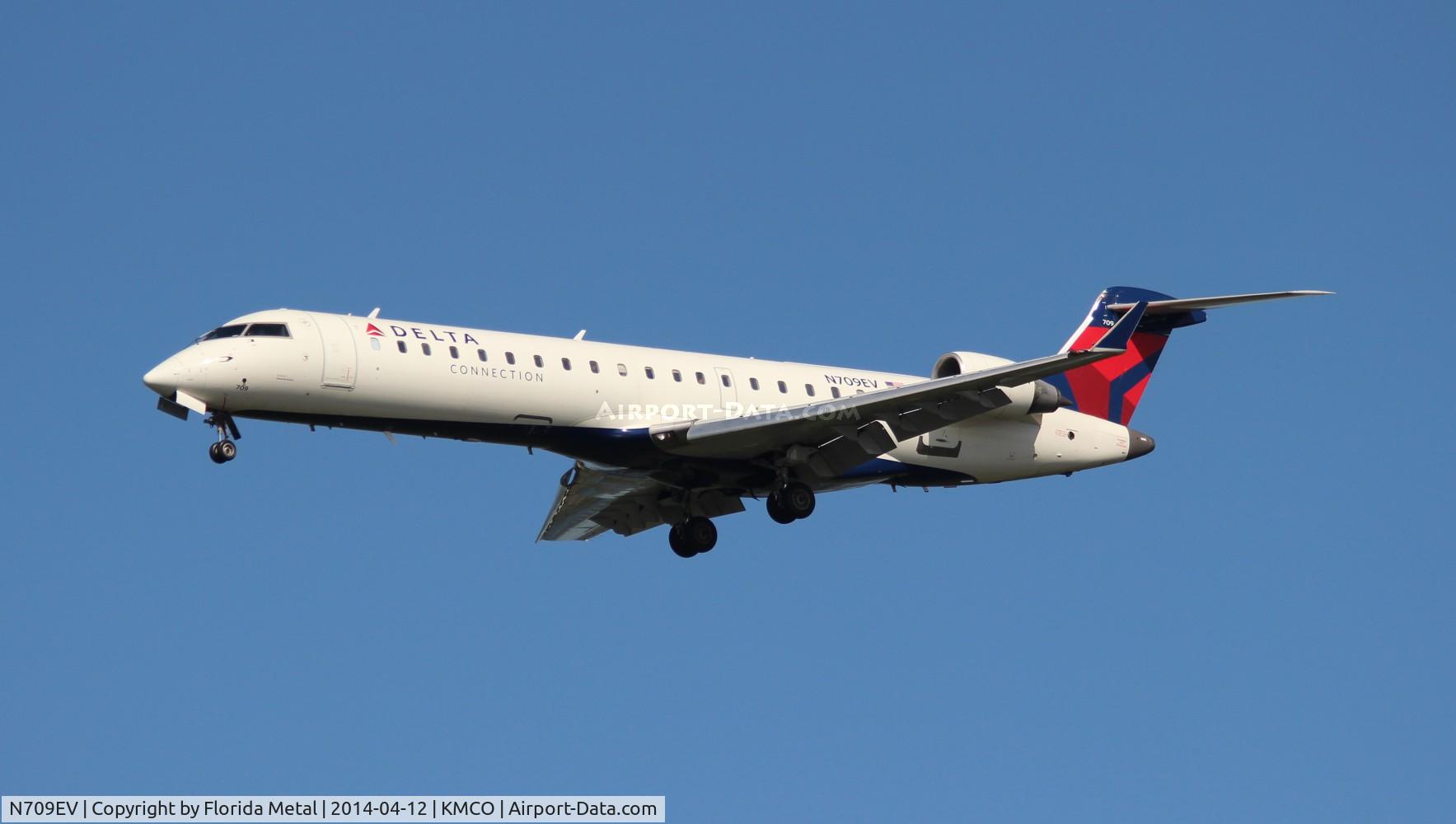 N709EV, 2002 Bombardier CRJ-701 (CL-600-2C10) Regional Jet C/N 10068, MCO spotting 2014