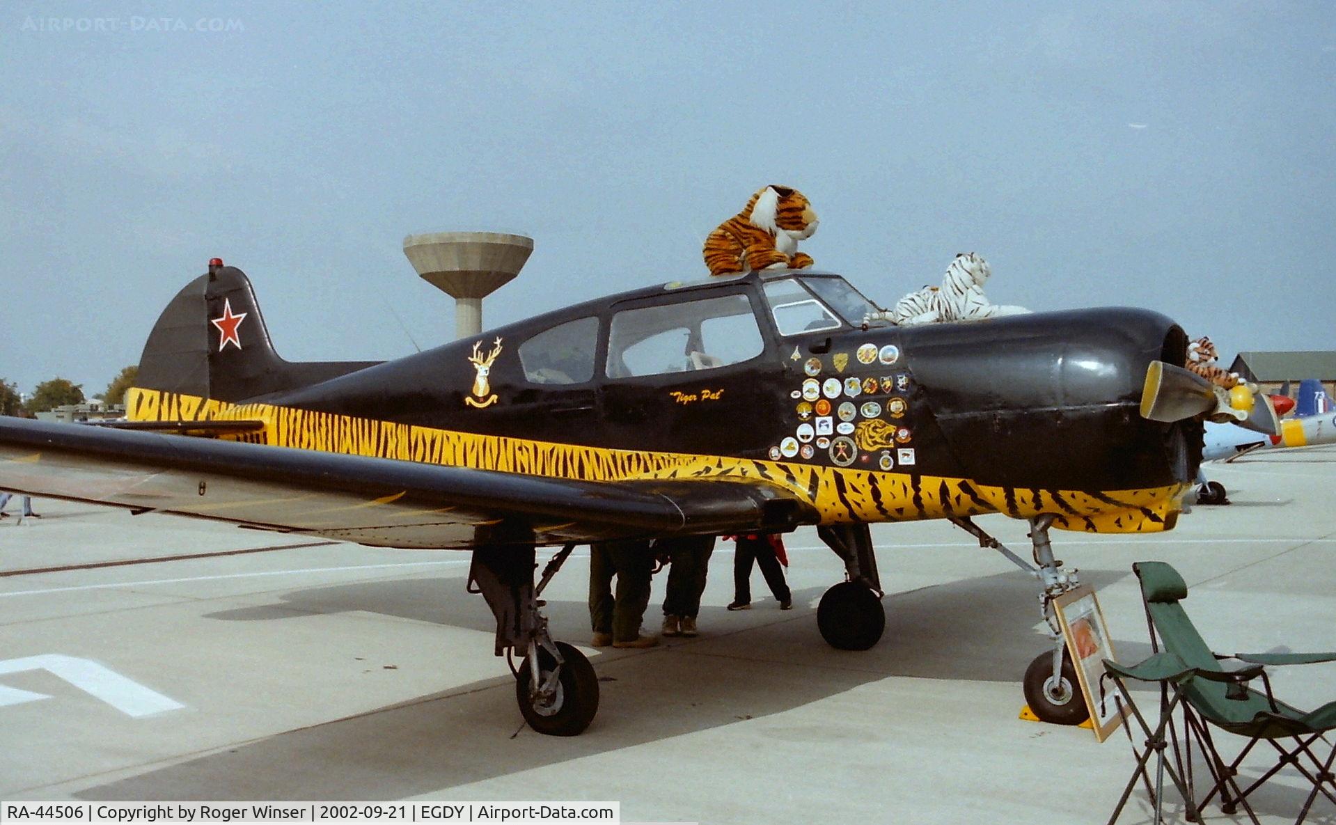 RA-44506, 1980 Yakovlev Yak-18T C/N 22202034139, In Tiger Pat markings on display at the 2002 RNAS Yeovilton Air Day