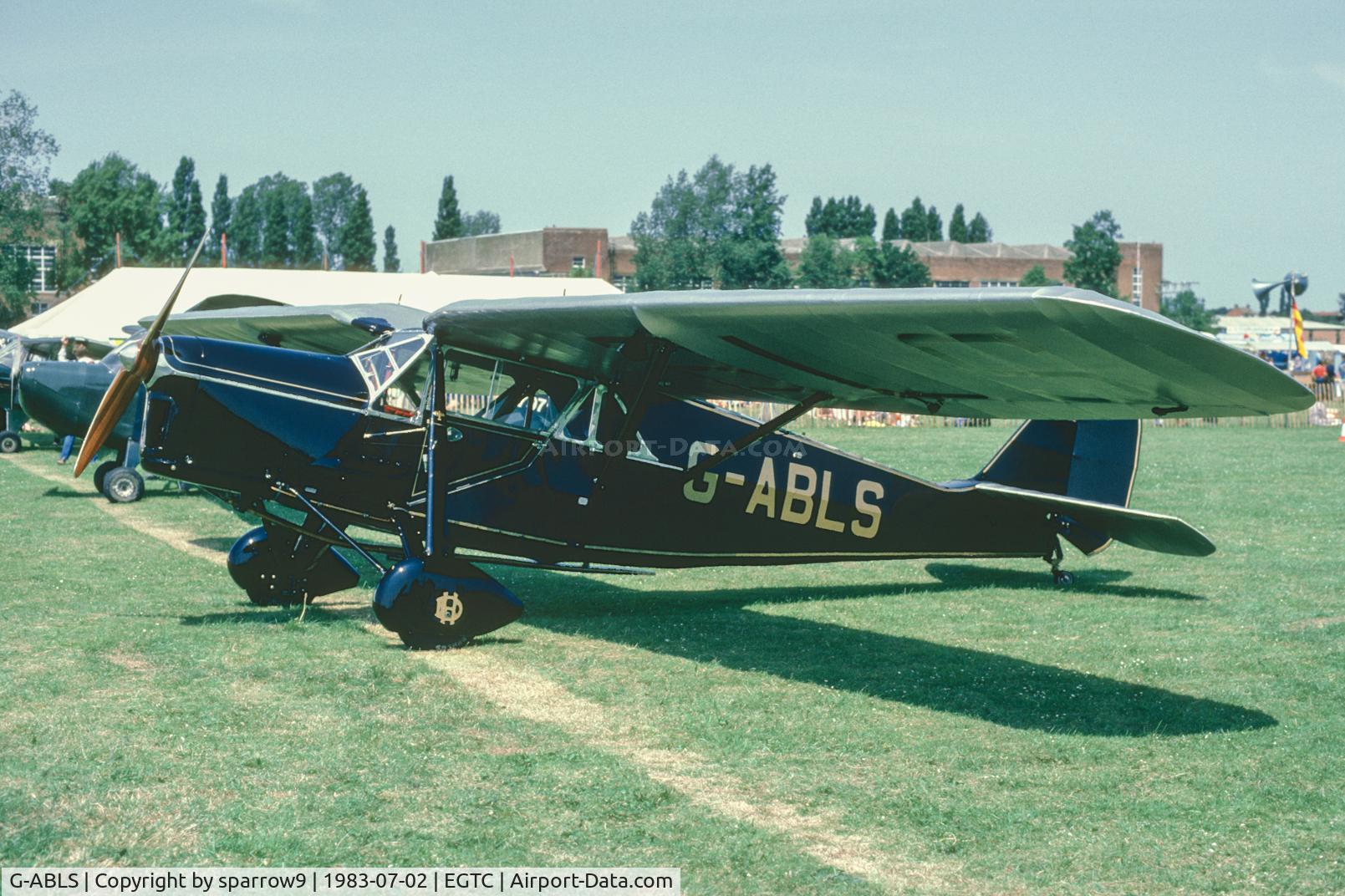 G-ABLS, 1931 De Havilland DH.80A Puss Moth C/N 2164, PFA-Rally Cranfield. Scanned from a slide.