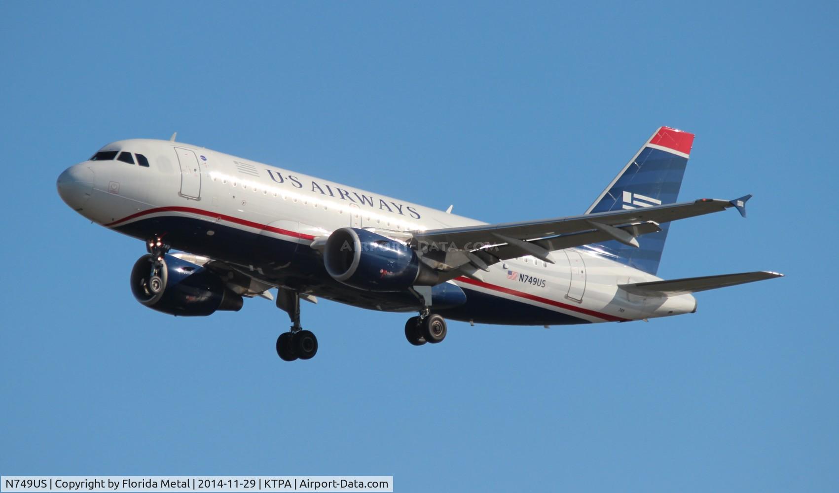 N749US, 2000 Airbus A319-112 C/N 1313, TPA spotting 2014