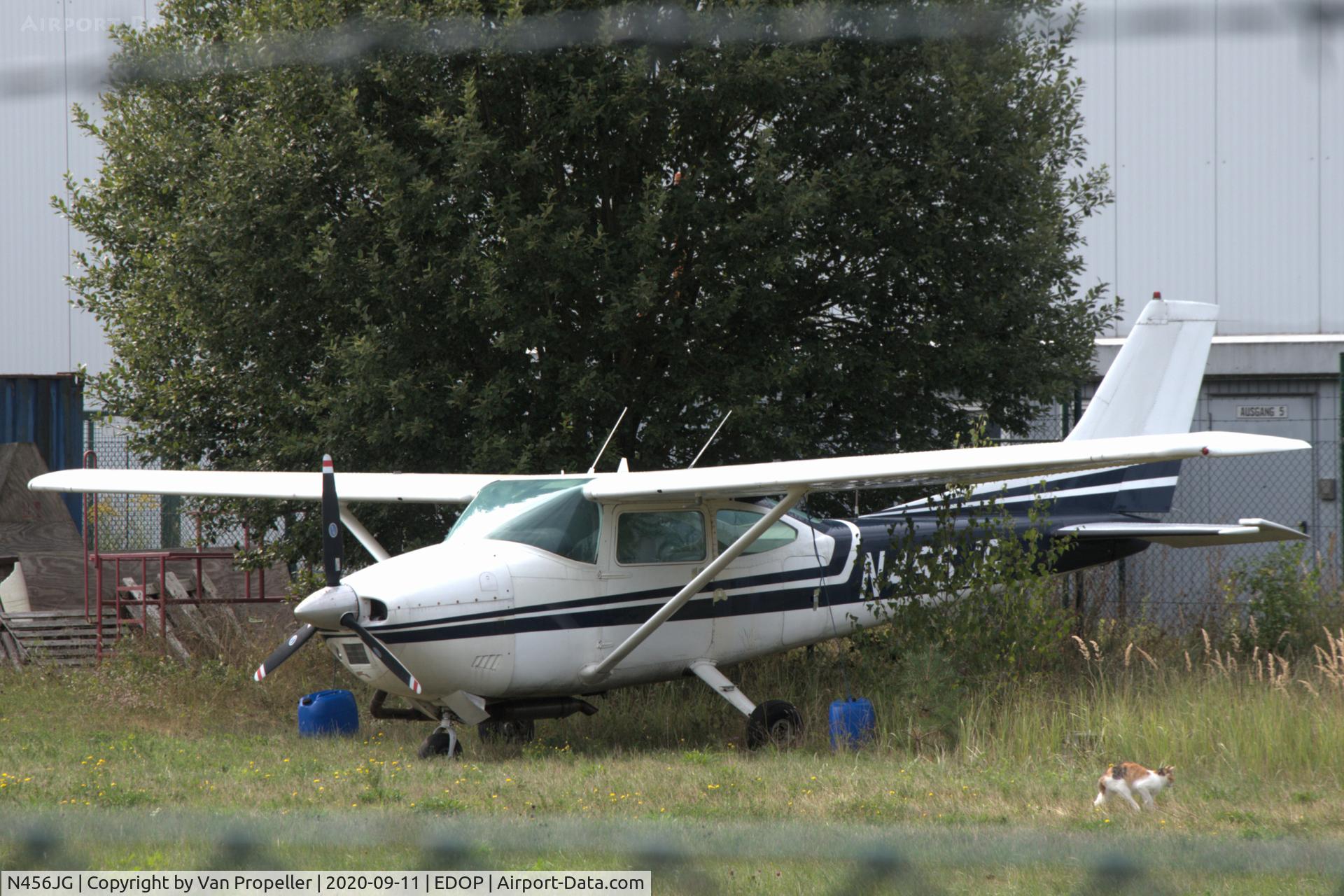 N456JG, 1975 Cessna 182P Skylane C/N 18264380, Cessna 182P Skylane at Schwerin-Parchim airport, Germany. It looks abandoned in the hunting territory of the airport cat.