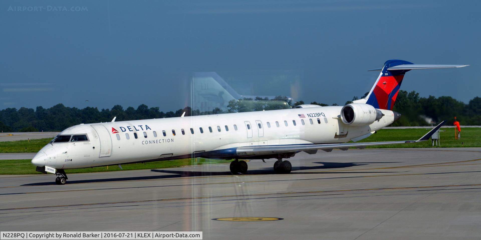 N228PQ, 2009 Bombardier CRJ-900ER (CL-600-2D24) C/N 15228, Taxi Lexington