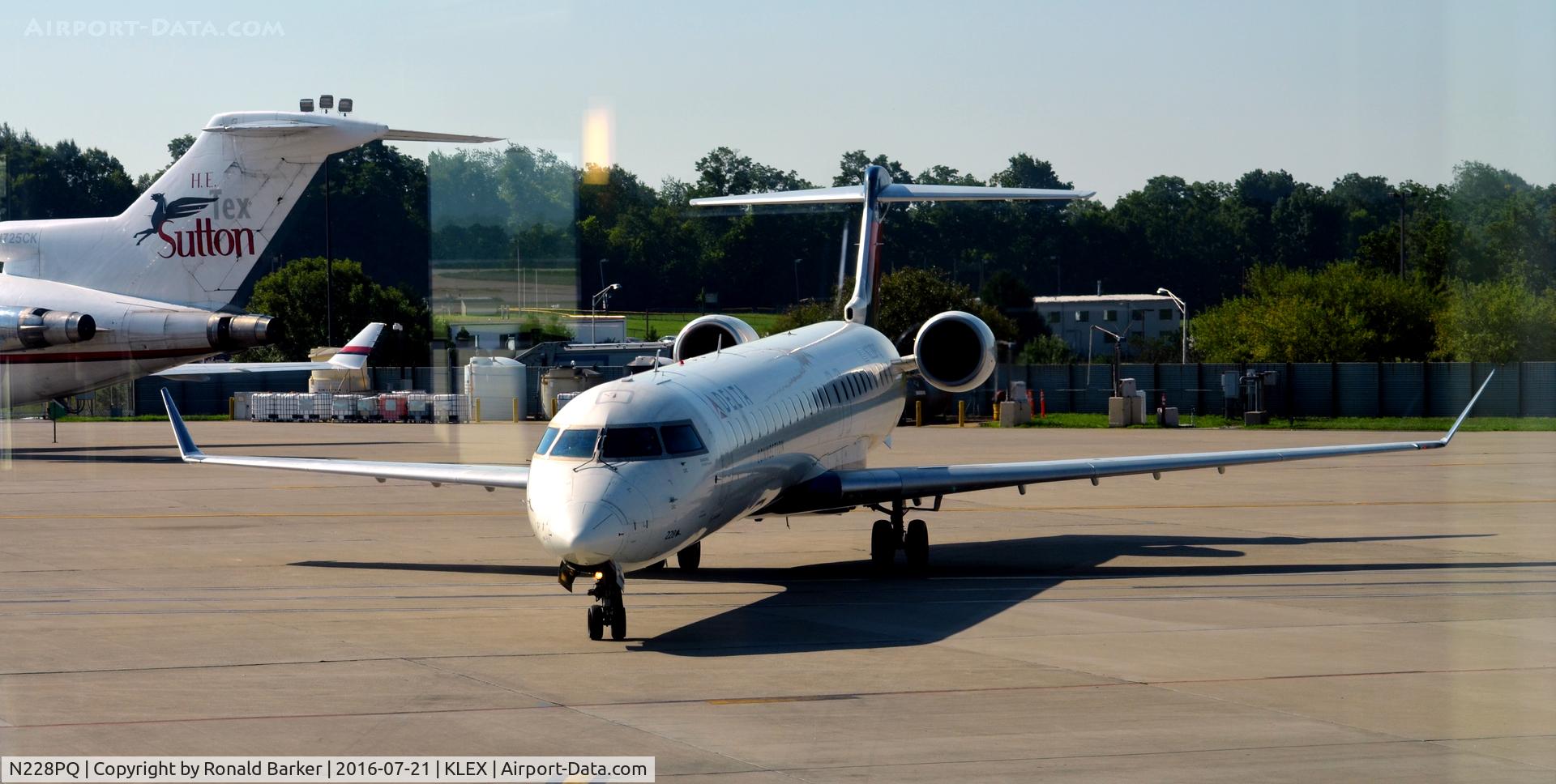 N228PQ, 2009 Bombardier CRJ-900ER (CL-600-2D24) C/N 15228, Taxi Lexington