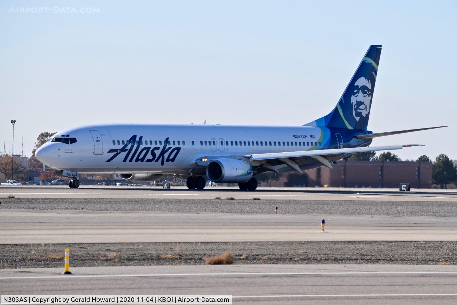 N303AS, 2001 Boeing 737-990 C/N 30016, Landing roll out on 10L.