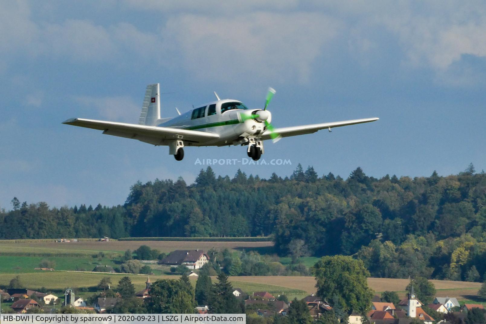 HB-DWI, 1976 Mooney M20F Executive Executive C/N 22-1411, Departing runway 24 Grenchen