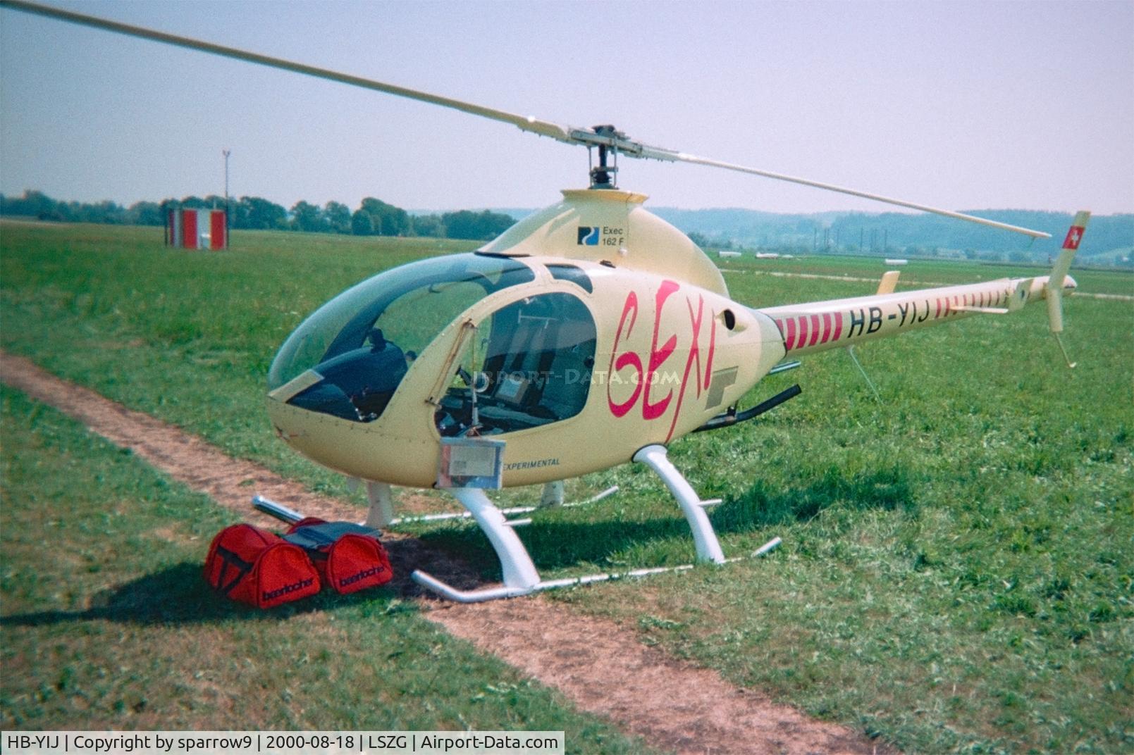 HB-YIJ, 1998 Rotorway Exec 162F C/N 6068, At Grenchen. Scanned from a negative.
