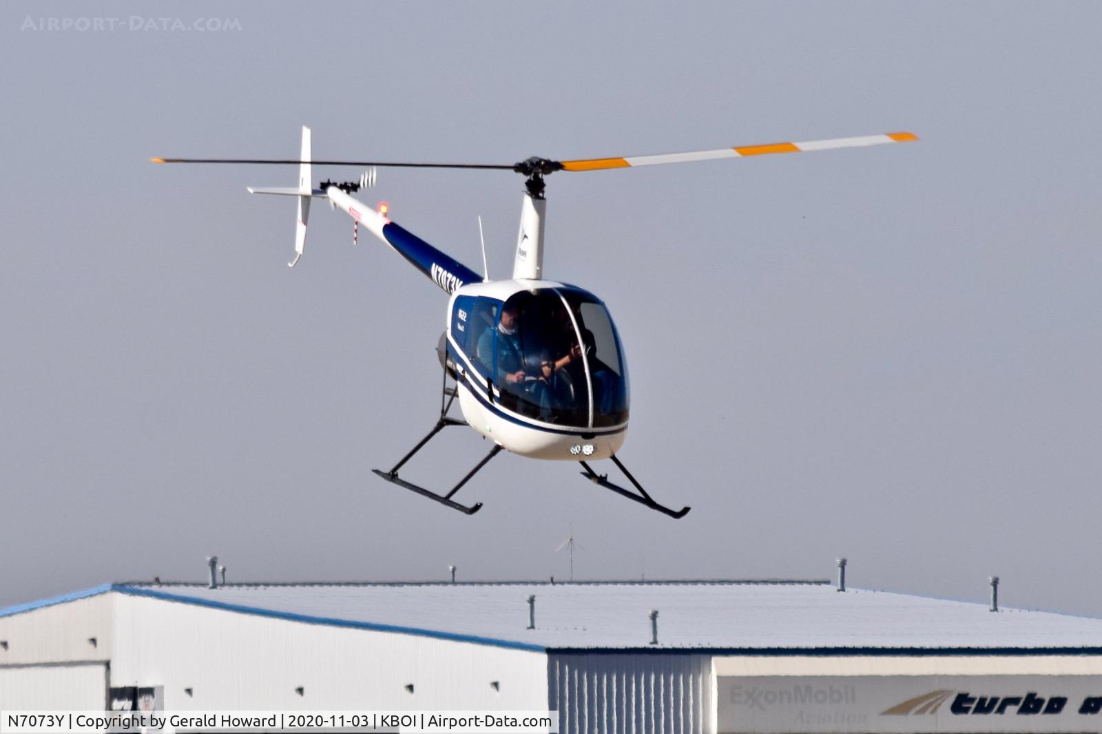 N7073Y, 2014 Robinson R22 Beta C/N 4650, Climb out.