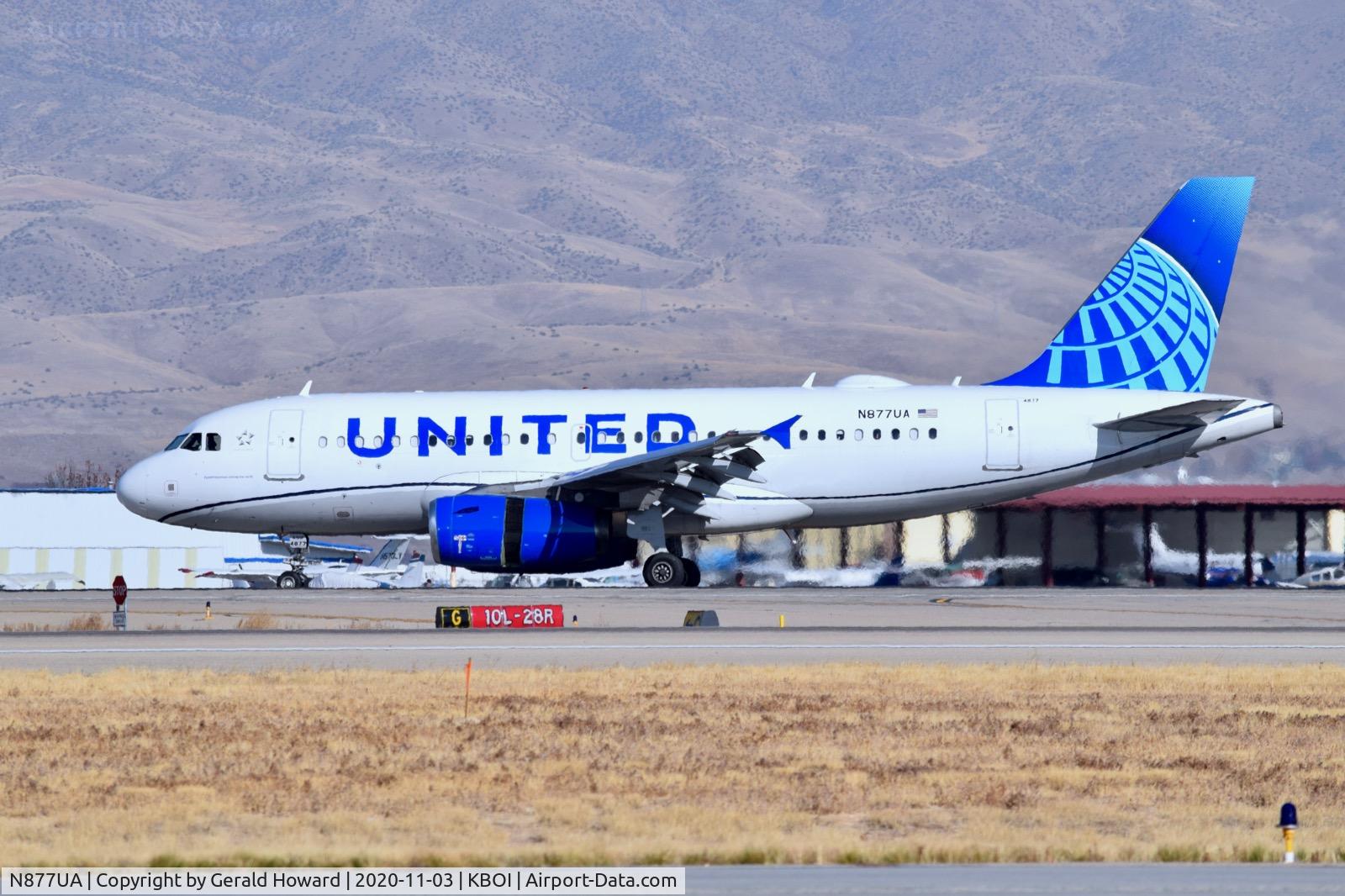 N877UA, 2004 Airbus A319-132 C/N 2232, Landing 28R.