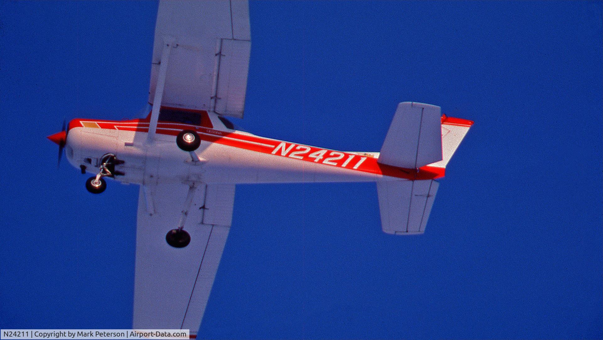 N24211, 1977 Cessna 152 C/N 15280151, Landing at Crystal Airport, MN.