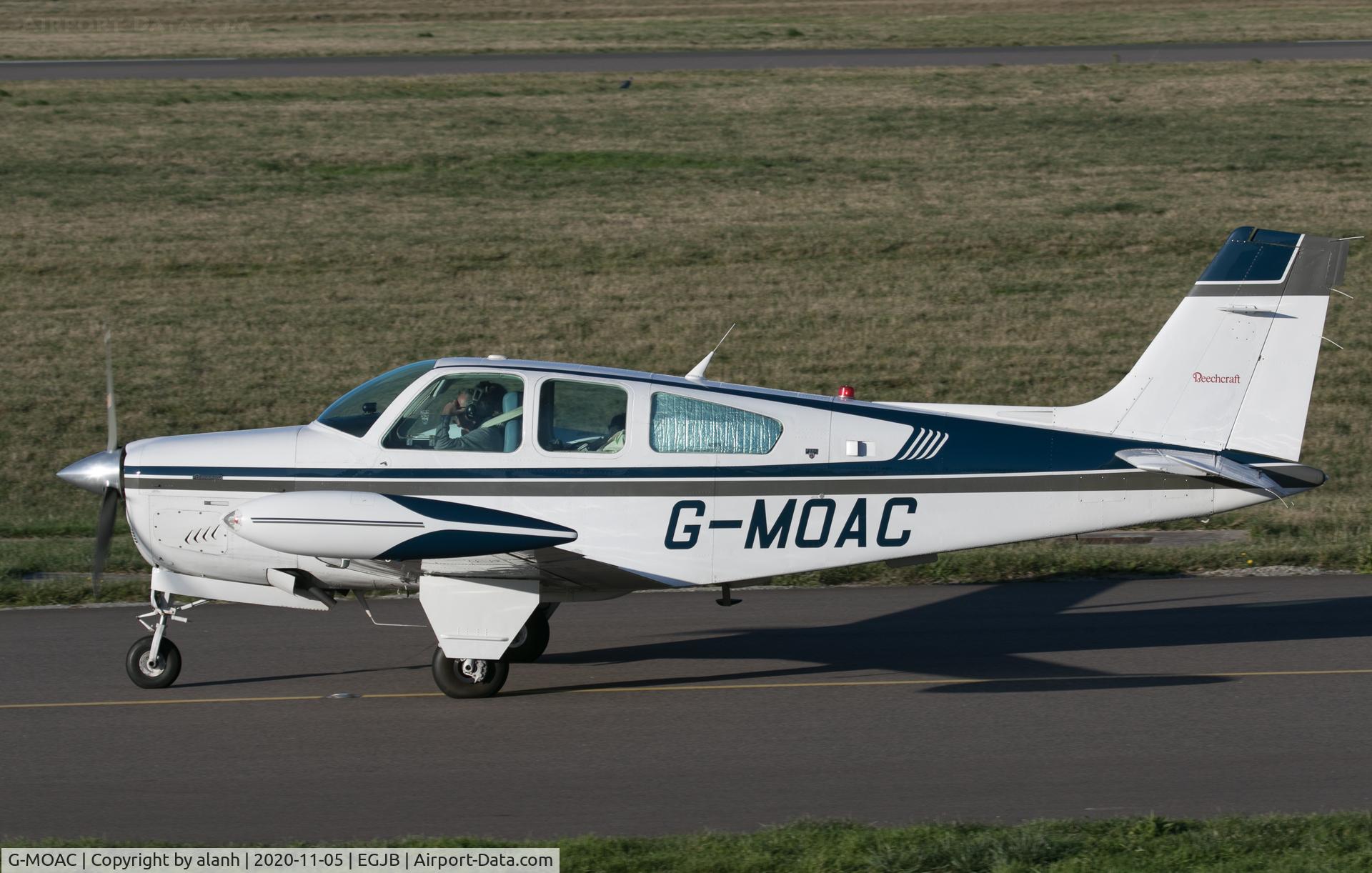 G-MOAC, 1989 Beech F33A Bonanza Bonanza C/N CE-1349, Taxying for departure at Guernsey