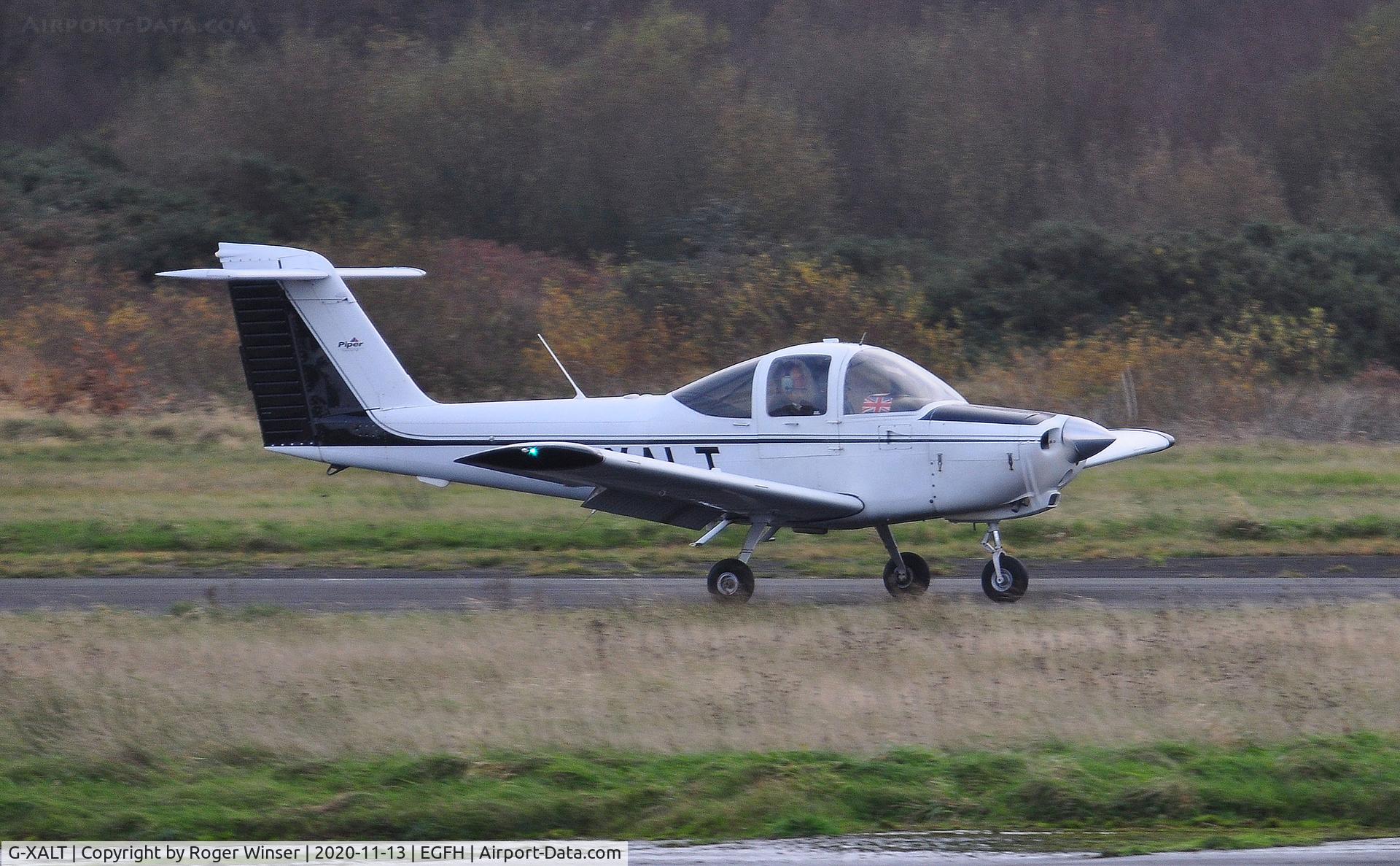 G-XALT, 1979 Piper PA-38-112 Tomahawk Tomahawk C/N 38-79A0801, Resident Tomahawk making a touch and go on Runway 28.