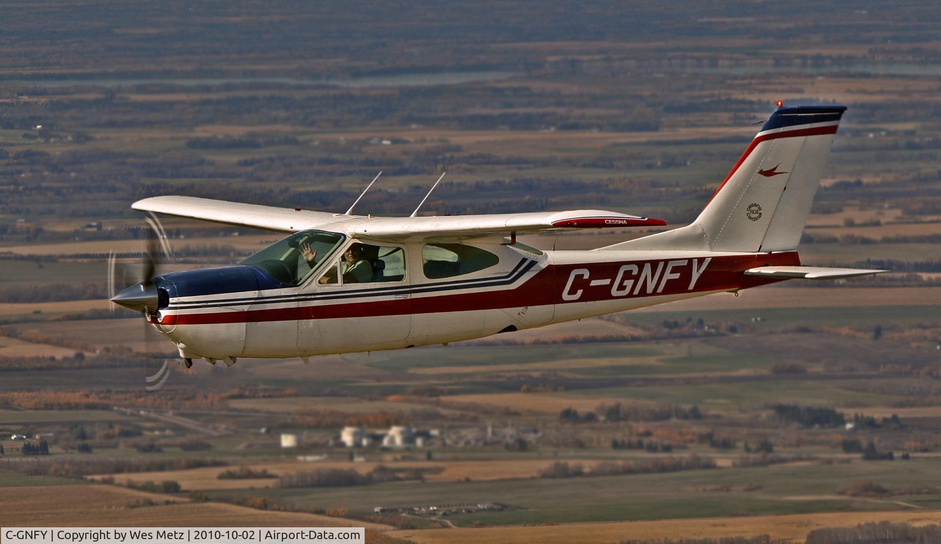C-GNFY, 1975 Cessna 177RG Cardinal C/N 177RG0618, C-GNFY in flight over Bowden, Alberta Canada. Heading back to CFX2 after the $100 hamburger.