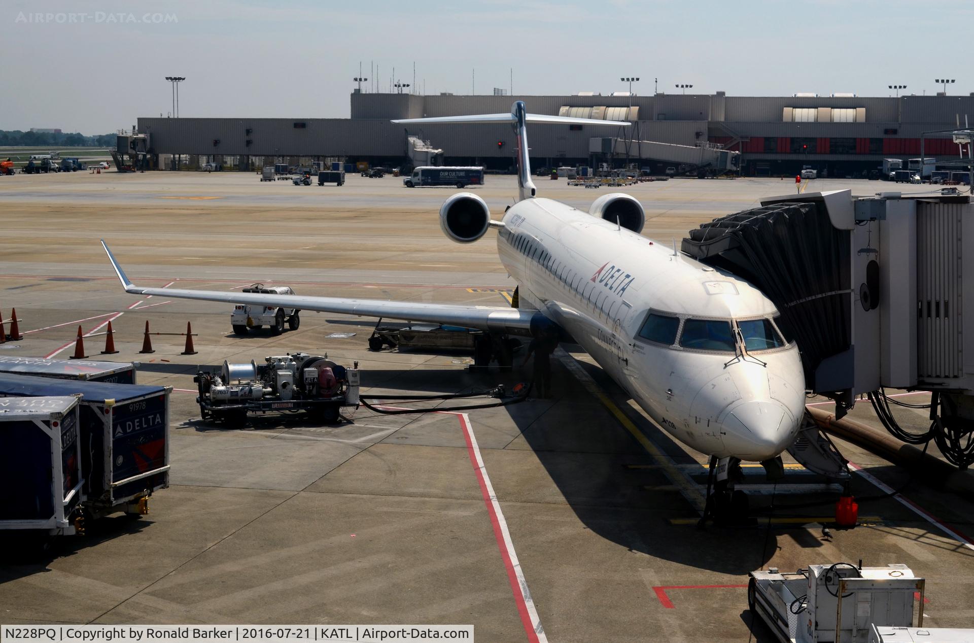 N228PQ, 2009 Bombardier CRJ-900ER (CL-600-2D24) C/N 15228, At the gate Atlanta