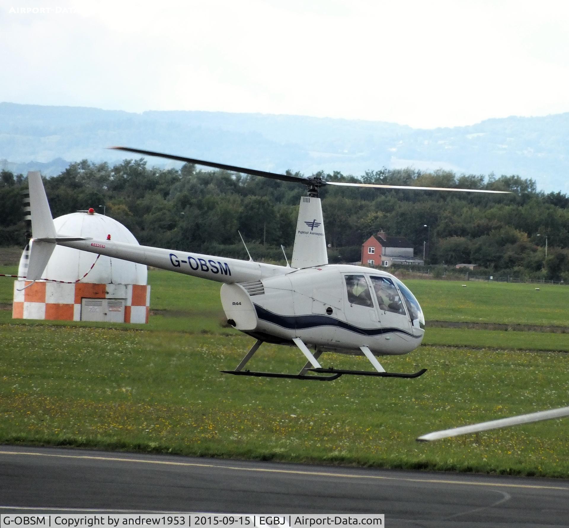 G-OBSM, 2001 Robinson R44 Raven C/N 1030, G-OBSM at Gloucestershire Airport.