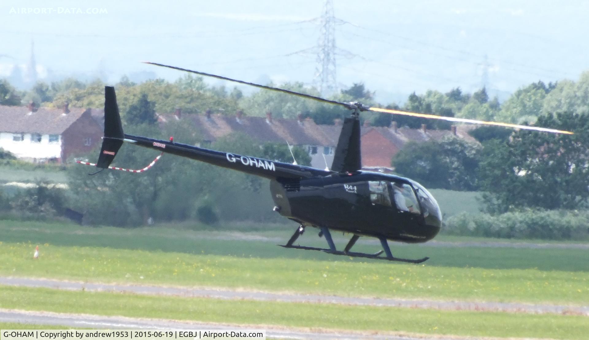 G-OHAM, 2005 Robinson R44 Raven II C/N 10743, G-OHAM at Gloucestershire Airport.