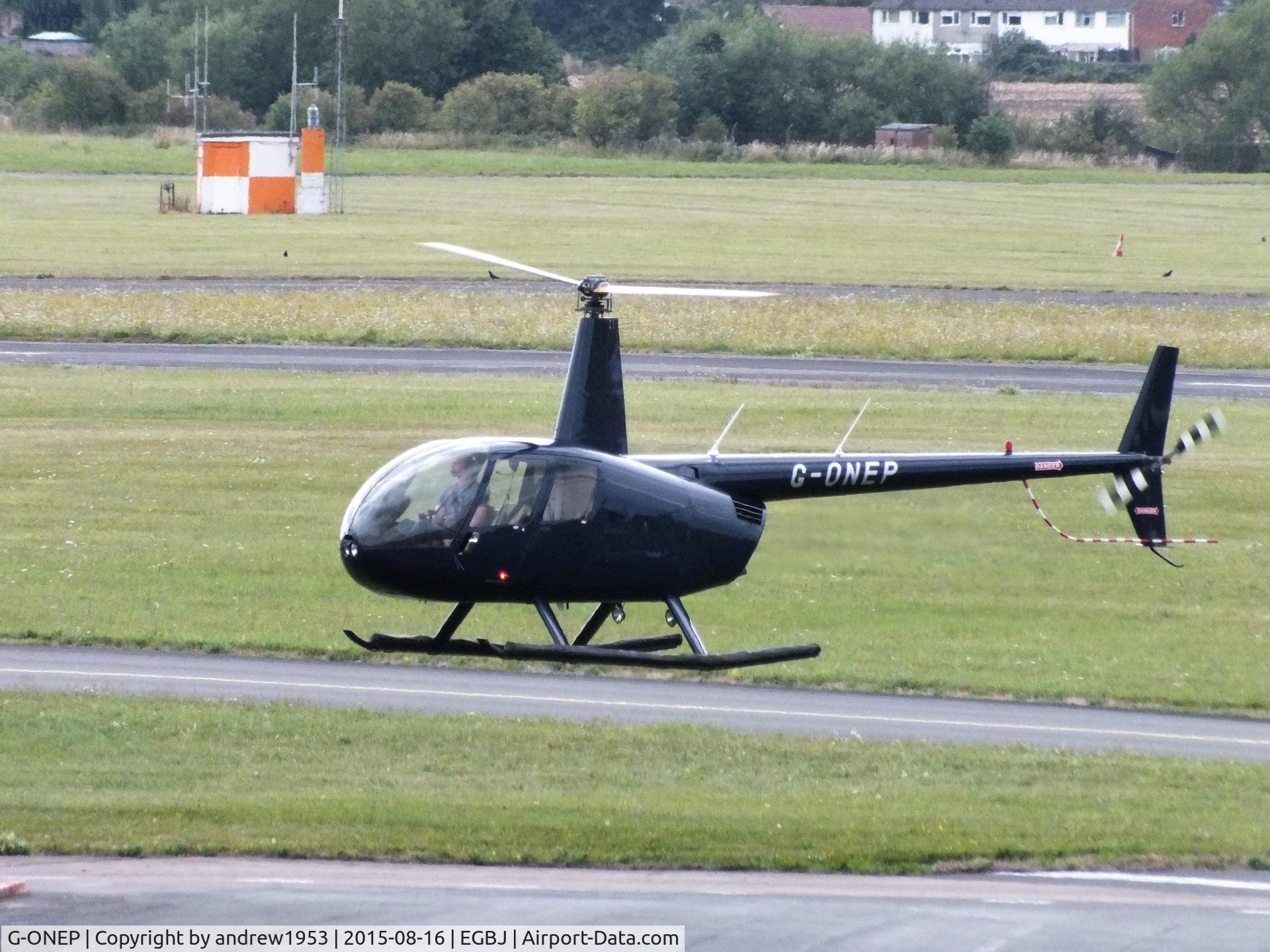 G-ONEP, 2006 Robinson R44 Raven II C/N 11363, G-ONEP at Gloucestershire Airport.