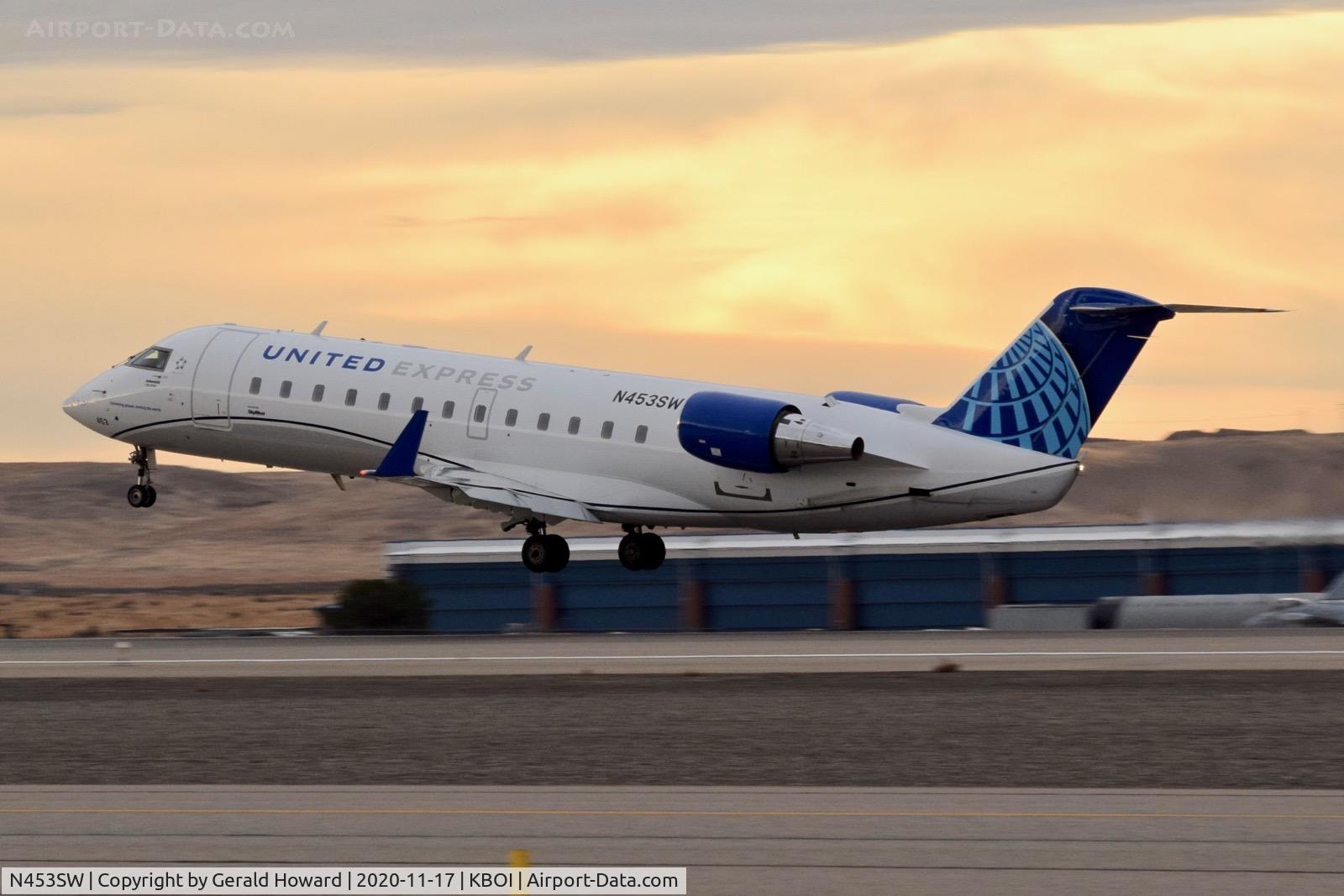 N453SW, 2003 Bombardier CRJ-200LR (CL-600-2B19) C/N 7743, Take off from 10L.