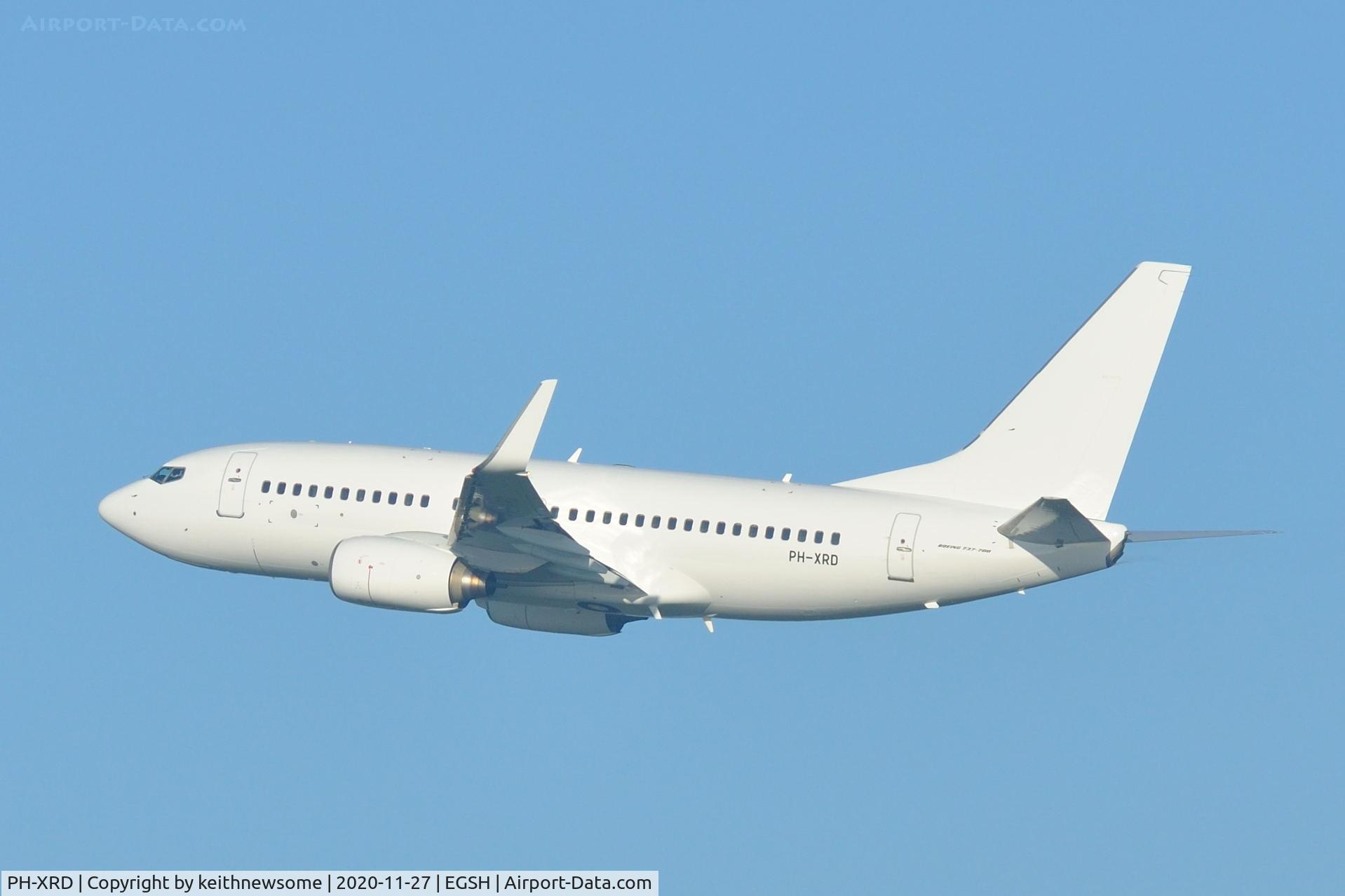 PH-XRD, 2003 Boeing 737-7K2 C/N 30659, Leaving Norwich for Amsterdam following paint to allover white.