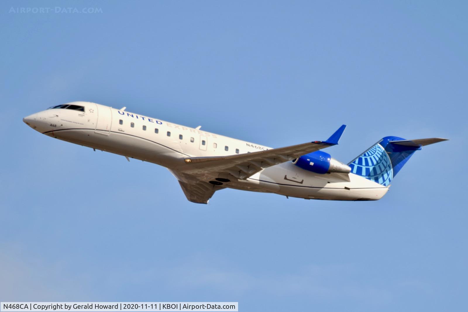 N468CA, 2002 Bombardier CRJ-200ER (CL-600-2B19) C/N 7649, Climb out from 28R.