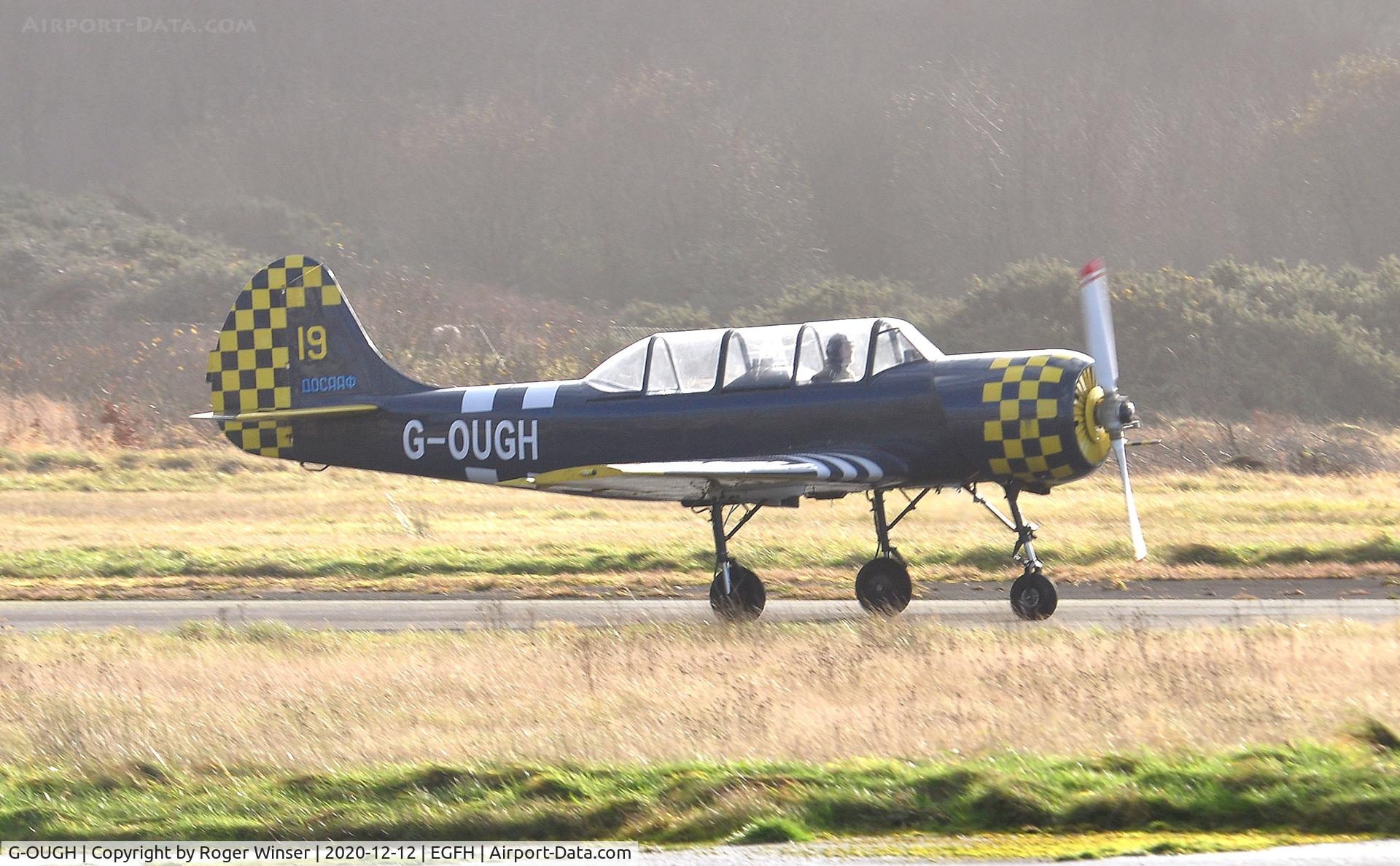 G-OUGH, 1987 Bacau Yak-52 C/N 877404, Resident Yak-52 arriving Runway 28.