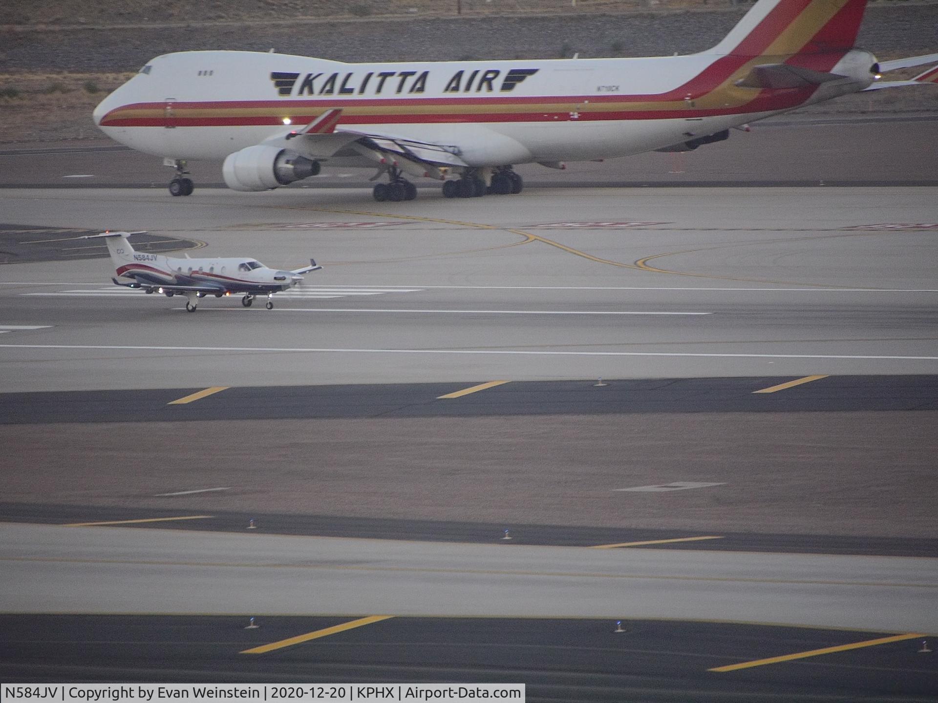N584JV, 2004 Pilatus PC-12/45 C/N 584, 747-400 Departing after the much smaller Pilatus PC-12/45