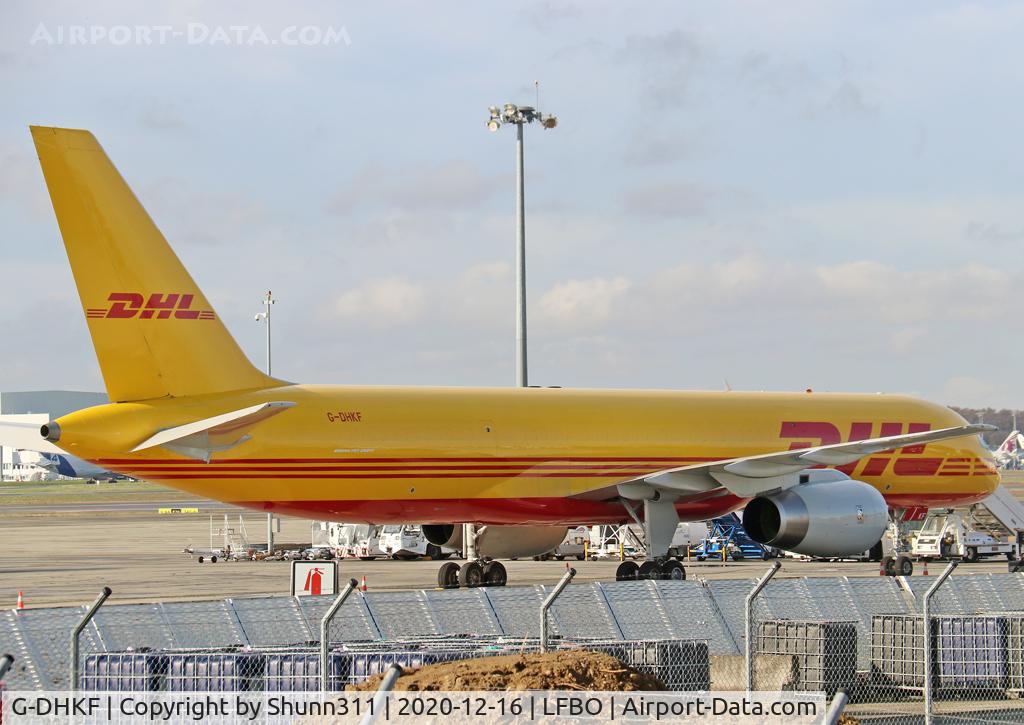 G-DHKF, 1999 Boeing 757-236/SF C/N 29945, Parked at the Cargo area...