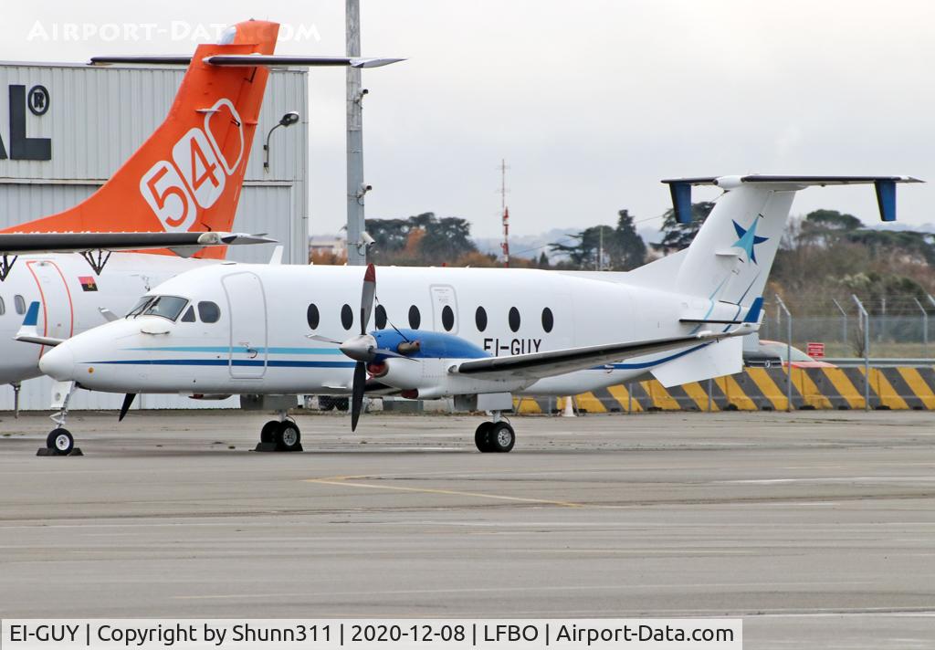 EI-GUY, 1999 Beech 1900D C/N UE-379, Parked at the General Aviaition area...