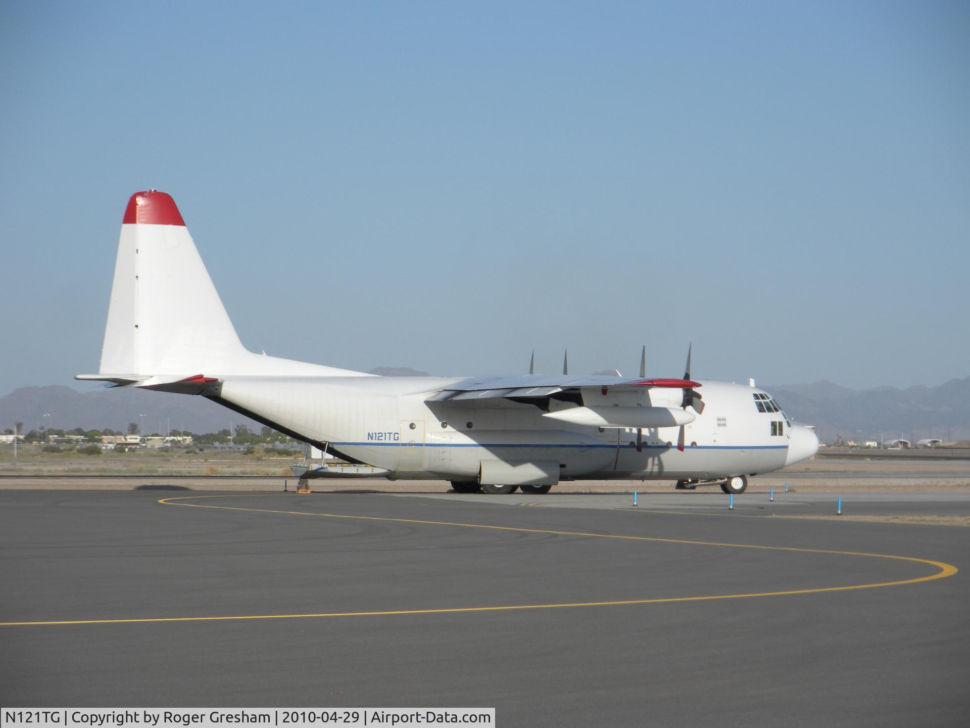 N121TG, Lockheed C-130A Hercules C/N 182-3119, sitting on ramp at Yuma Arizona