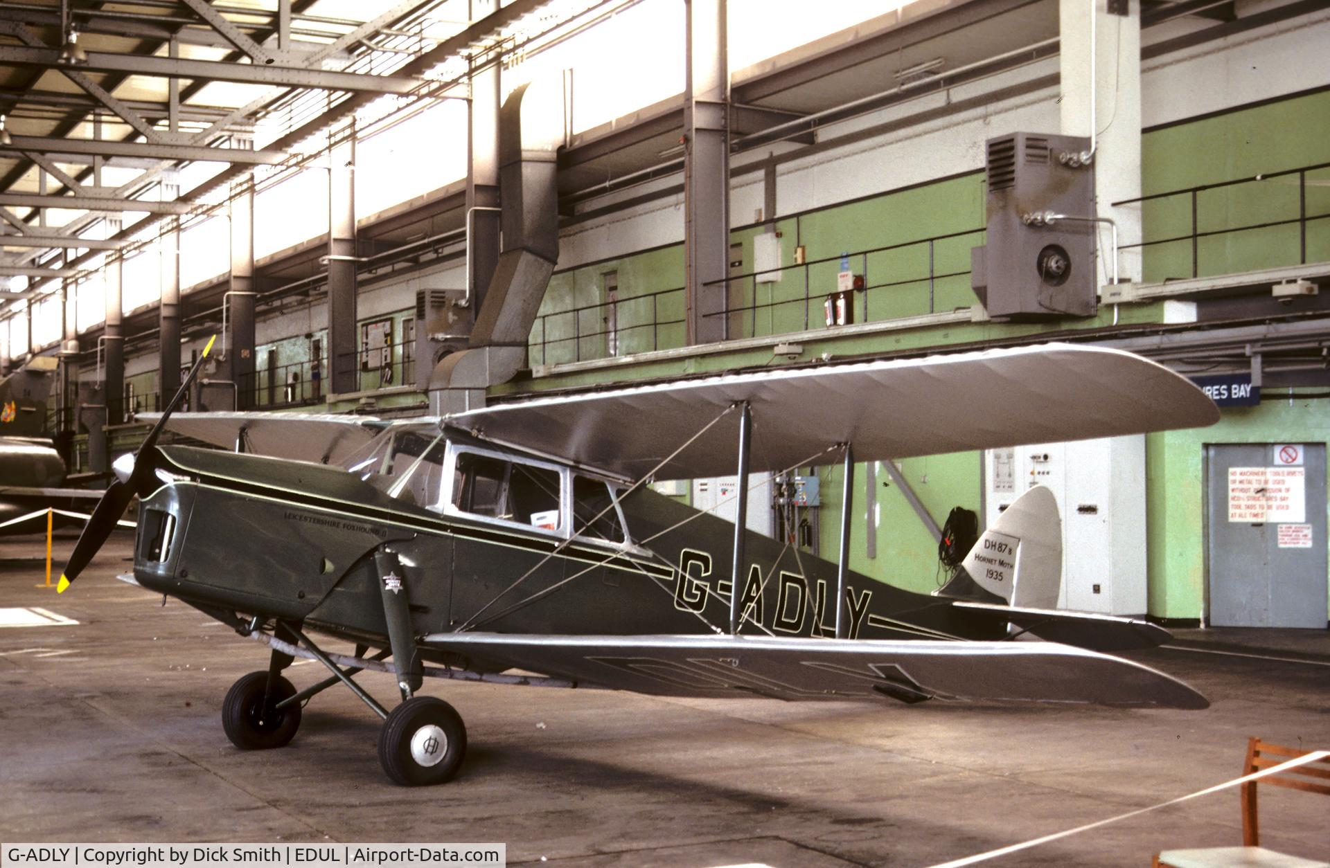 G-ADLY, 1935 De Havilland DH.87B Hornet Moth C/N 8020, at RAF Laarbruch, Germany beginning of 1990s