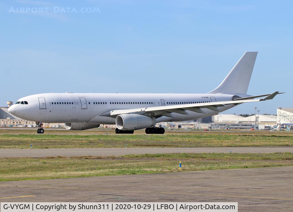 G-VYGM, 2015 Airbus A330-243 C/N 1601, Taxiing holding point rwy 32R for departure... All white, no titles... Flight for Titan Airways...