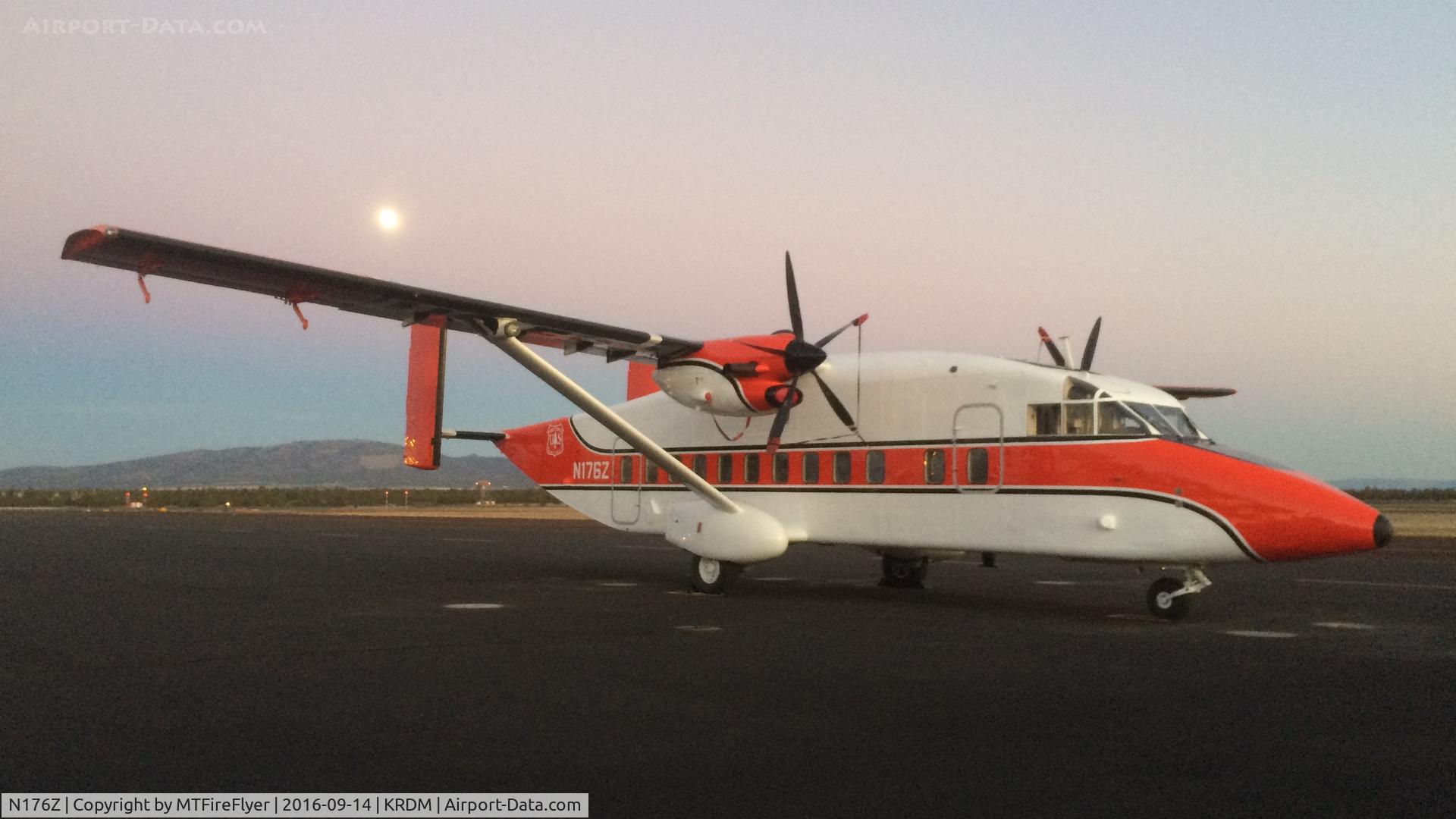 N176Z, 1997 Short C-23C Sherpa C/N SH3411, C-23C Sherpa N176Z (93-1327) resting under a full moon in her new US Forest Service uniform on the Redmond Air Center (RAC) Smokejumper ramp in Redmond, OR (KRDM/RDM).