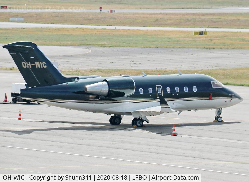 OH-WIC, 2000 Bombardier Challenger 604 (CL-600-2B16) C/N 5452, Parked at the General Aviation area...