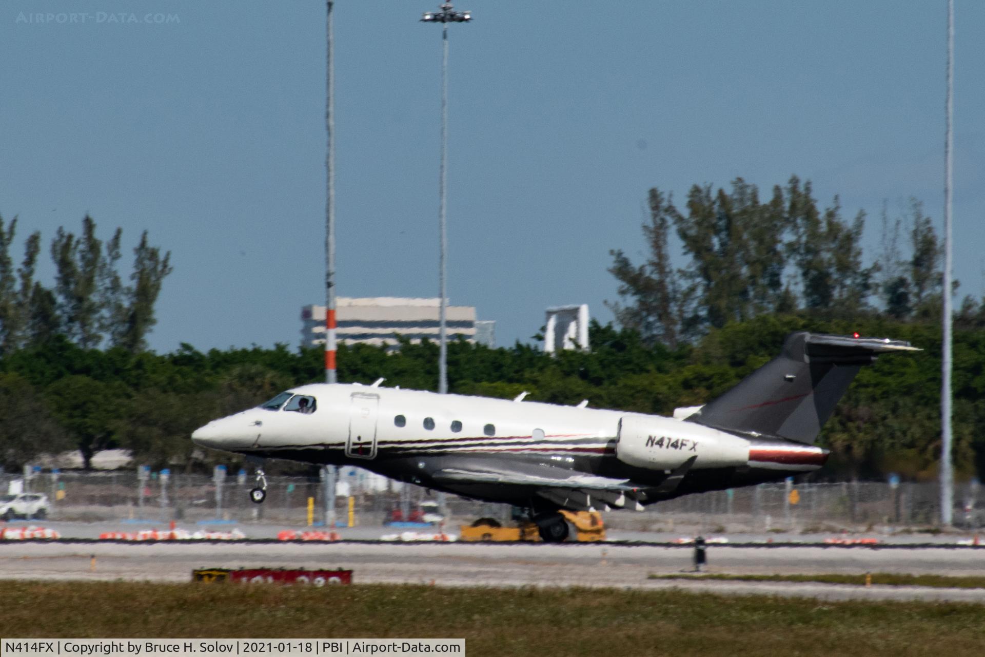 N414FX, 2017 Embraer EMB-550 Legacy 450 C/N 55010031, taking off from PBI
