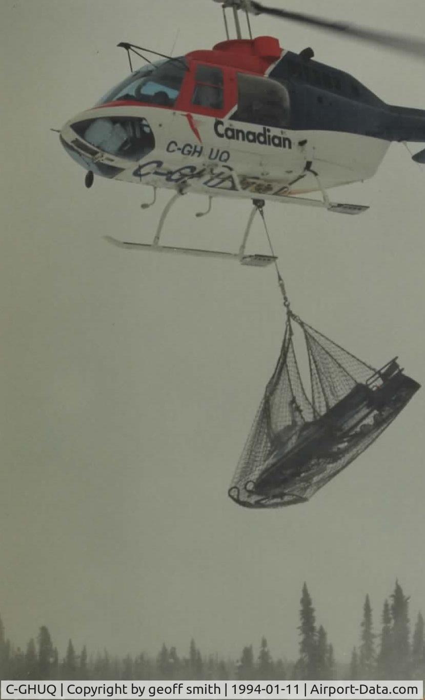 C-GHUQ, Bell 206B JetRanger II C/N 1721, January 1994 - taking out equipment after a survey. Near 60°10' N 117°20' W Daytime highs minus 35C