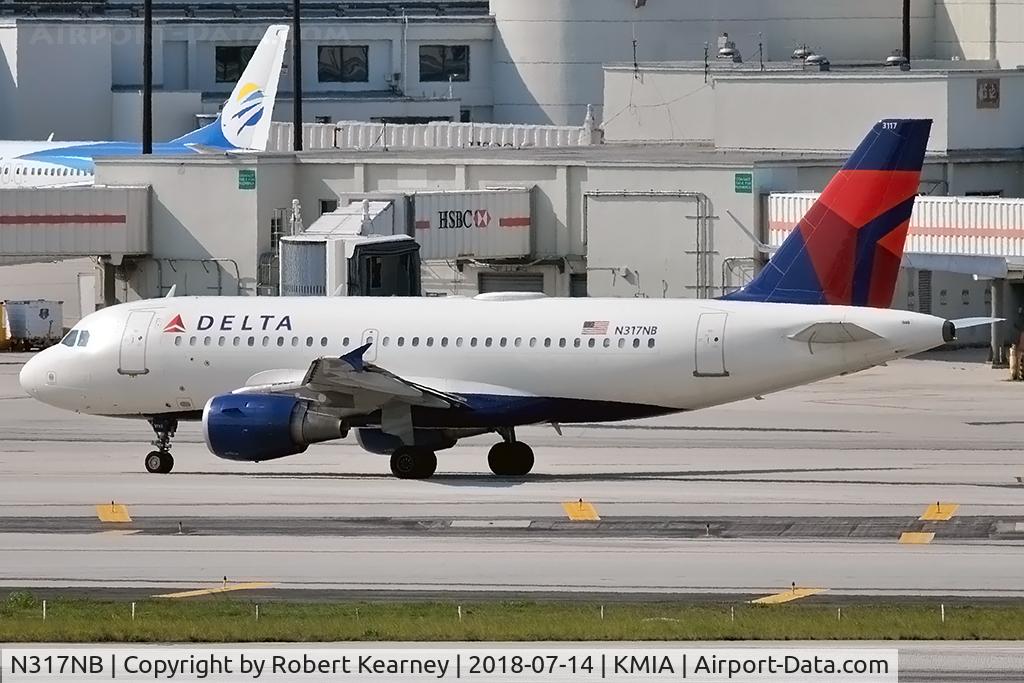 N317NB, 2000 Airbus A319-114 C/N 1324, Taxiing out for departure