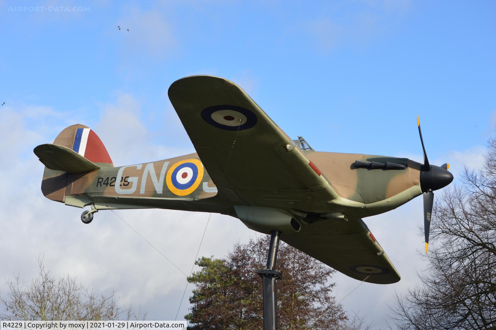 R4229, Hawker Hurricane 1 Replica C/N Not found, Hawker Hurricane Mk 1 replica in Alexander Gardens, Windsor, Berkshire. A memorial to the designer Sir Sidney Camm who was a Windsor resident. The markings are those of Squadron Leader John Grandy, Battle of Britain pilot who also spent time in Windsor.
