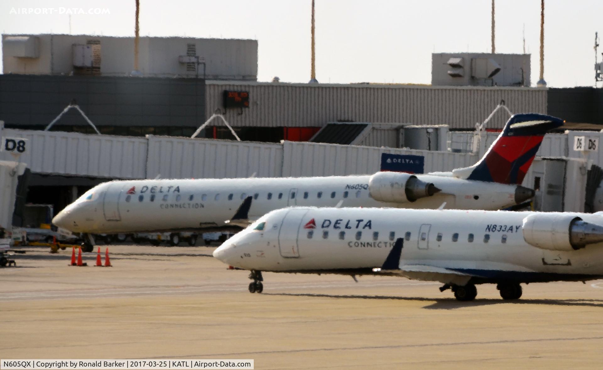 N605QX, 2002 Bombardier CRJ-701 (CL-600-2C10) Regional Jet C/N 10022, Pushback Atlanta