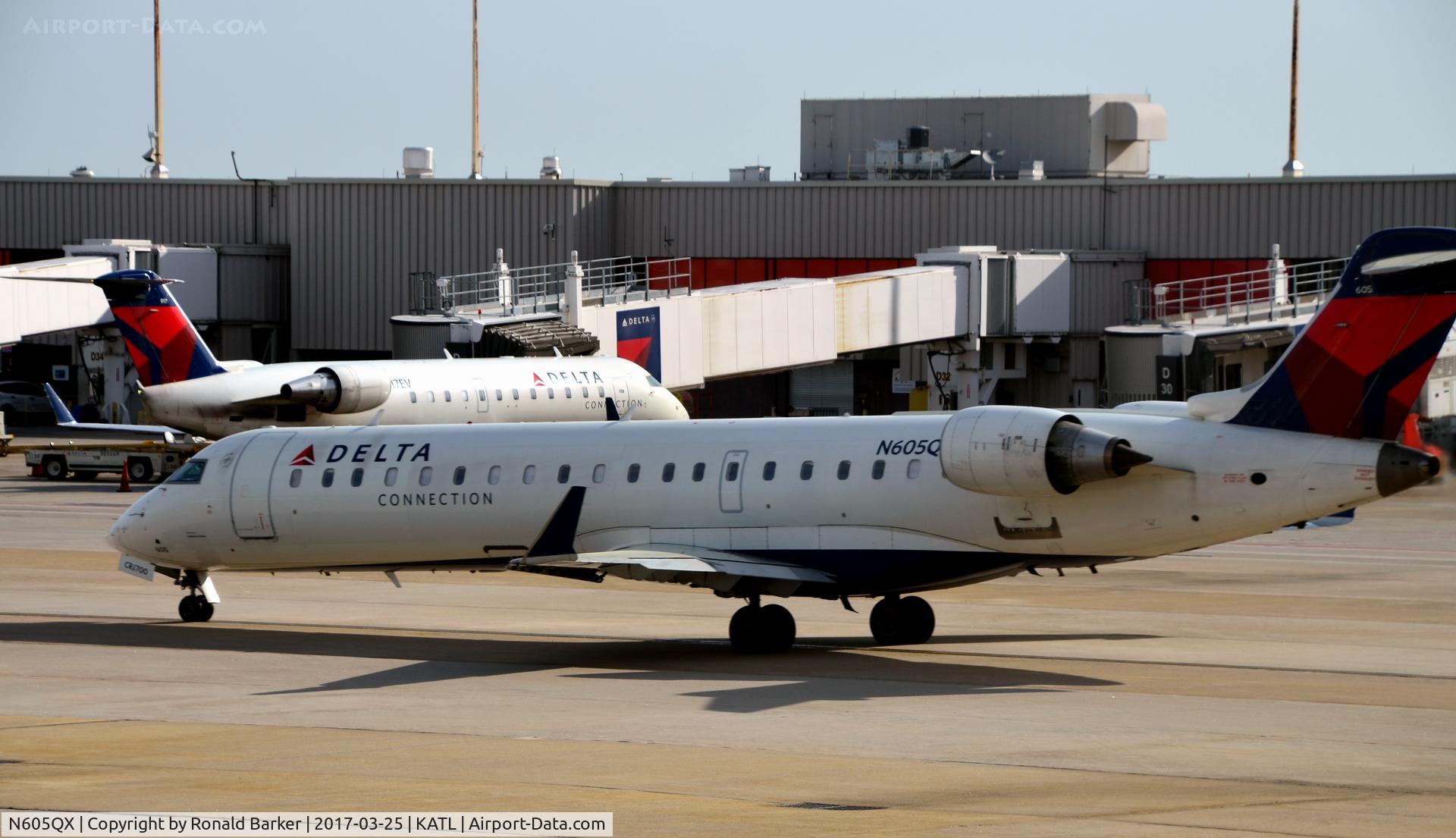 N605QX, 2002 Bombardier CRJ-701 (CL-600-2C10) Regional Jet C/N 10022, Taxi for takeoff Atlanta