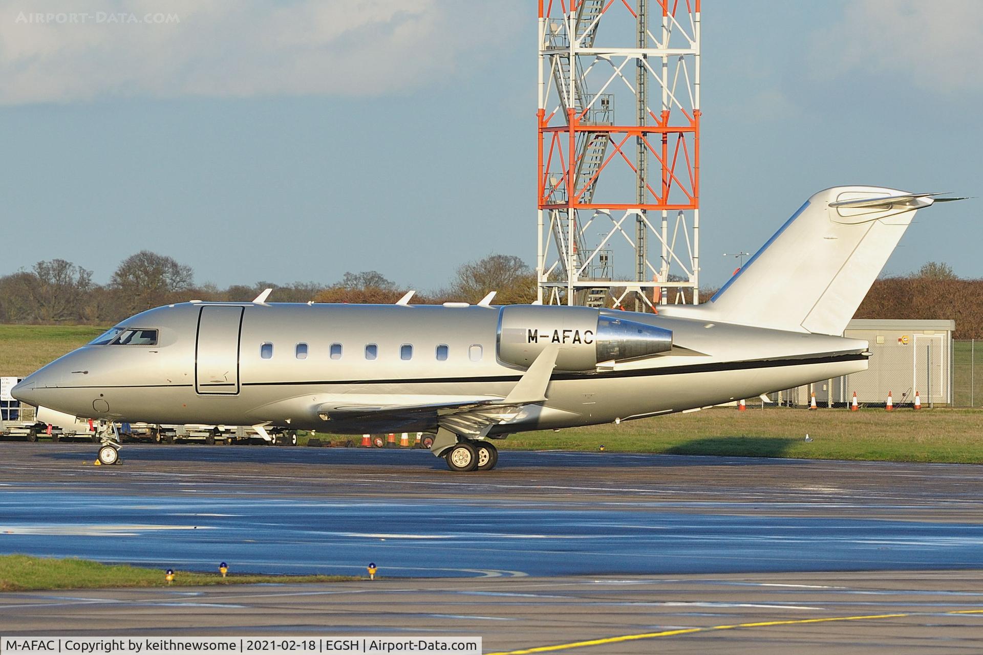 M-AFAC, 1999 Bombardier Challenger 604 (CL-600-2B16) C/N 5412, Removed from spray shop with new colour scheme.
