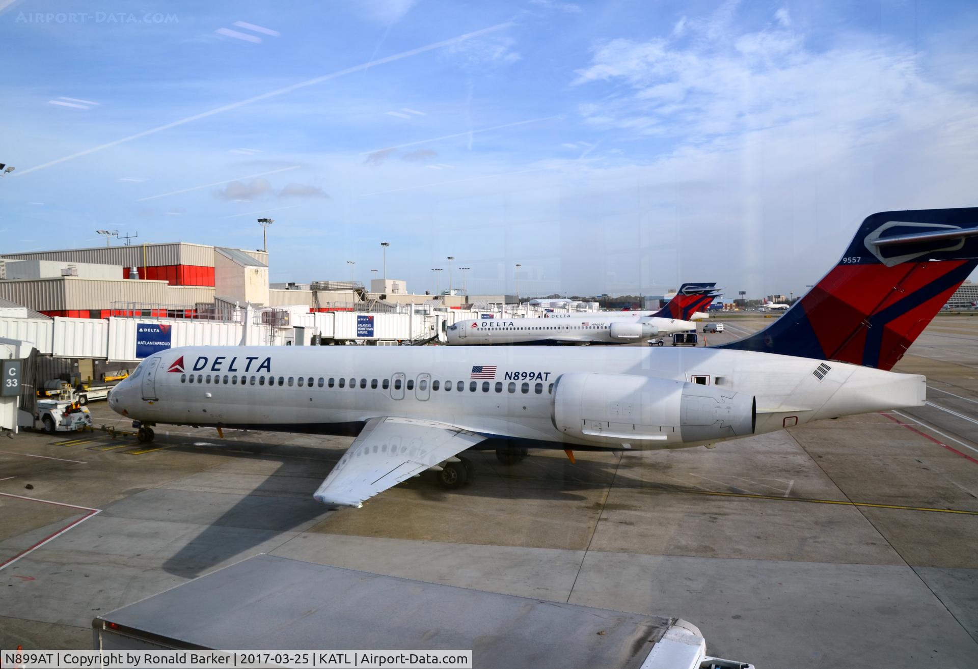 N899AT, 2005 Boeing 717-200 C/N 55049, Pushback from gate C33 Atlanta