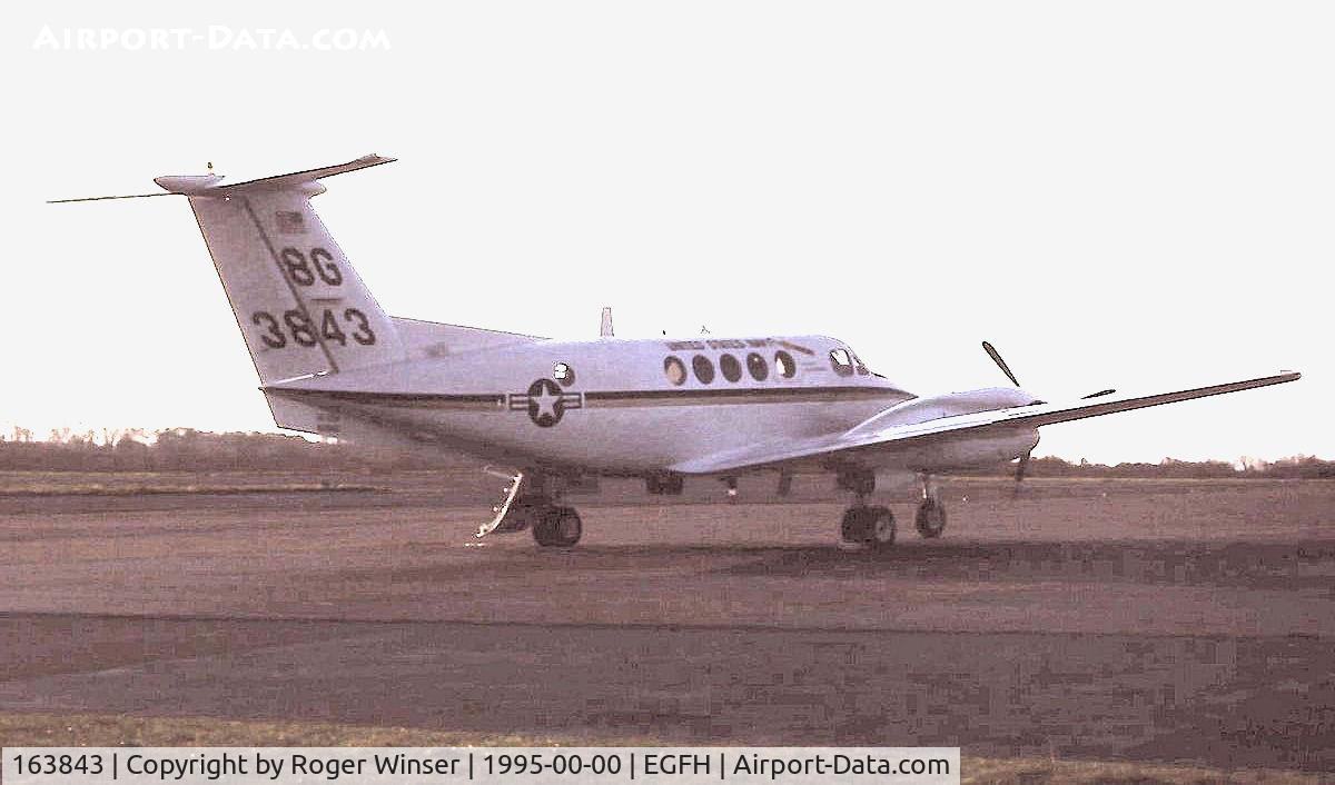 163843, 1987 Beech UC-12M Huron C/N BV-8, US Navy Huron aircraft from the Naval Air Facility at RAF Mildenhall visiting the airport in the mid-1990s.